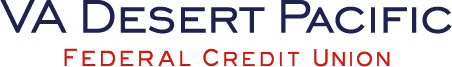 Sign reading 'VA Desert Pacific Federal Credit Union' with blue and red text.