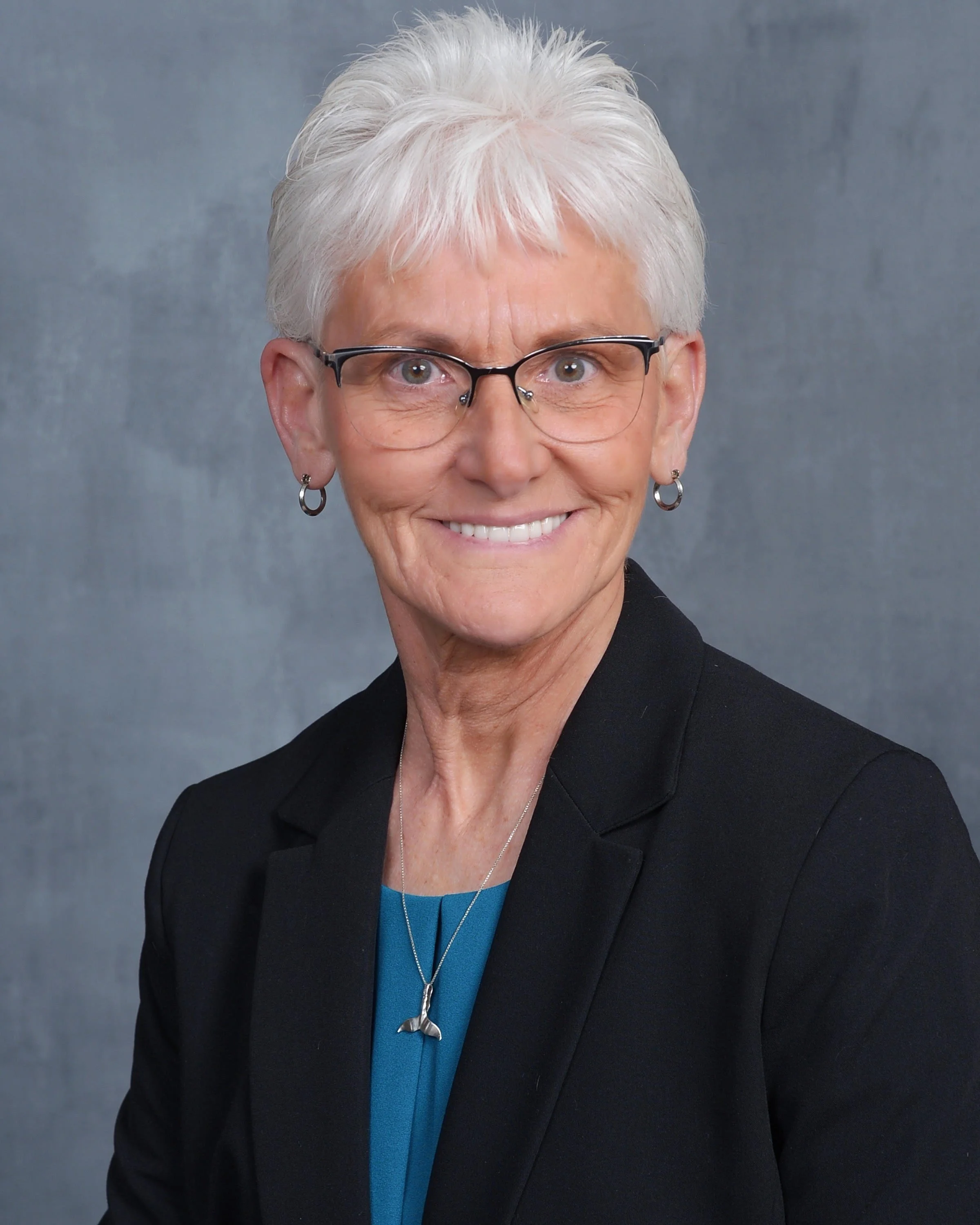 Karen Millett, Receptionist