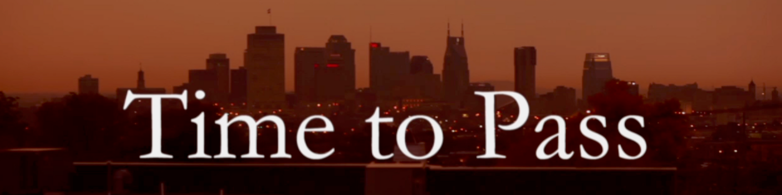 Sunset skyline of a city with tall buildings and the text 'Time to Pass' in white font.