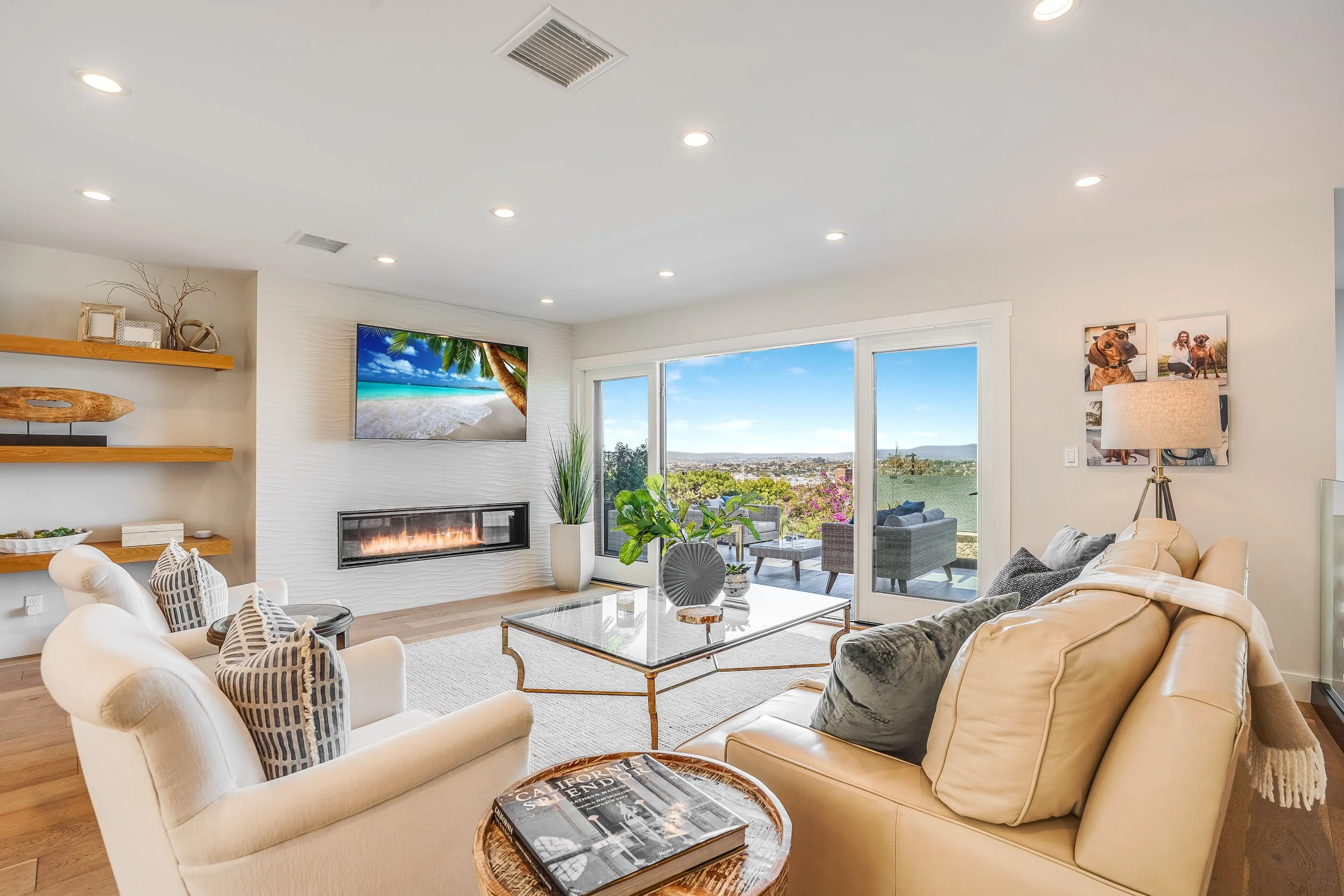Indoor-outdoor living room with gas fireplace