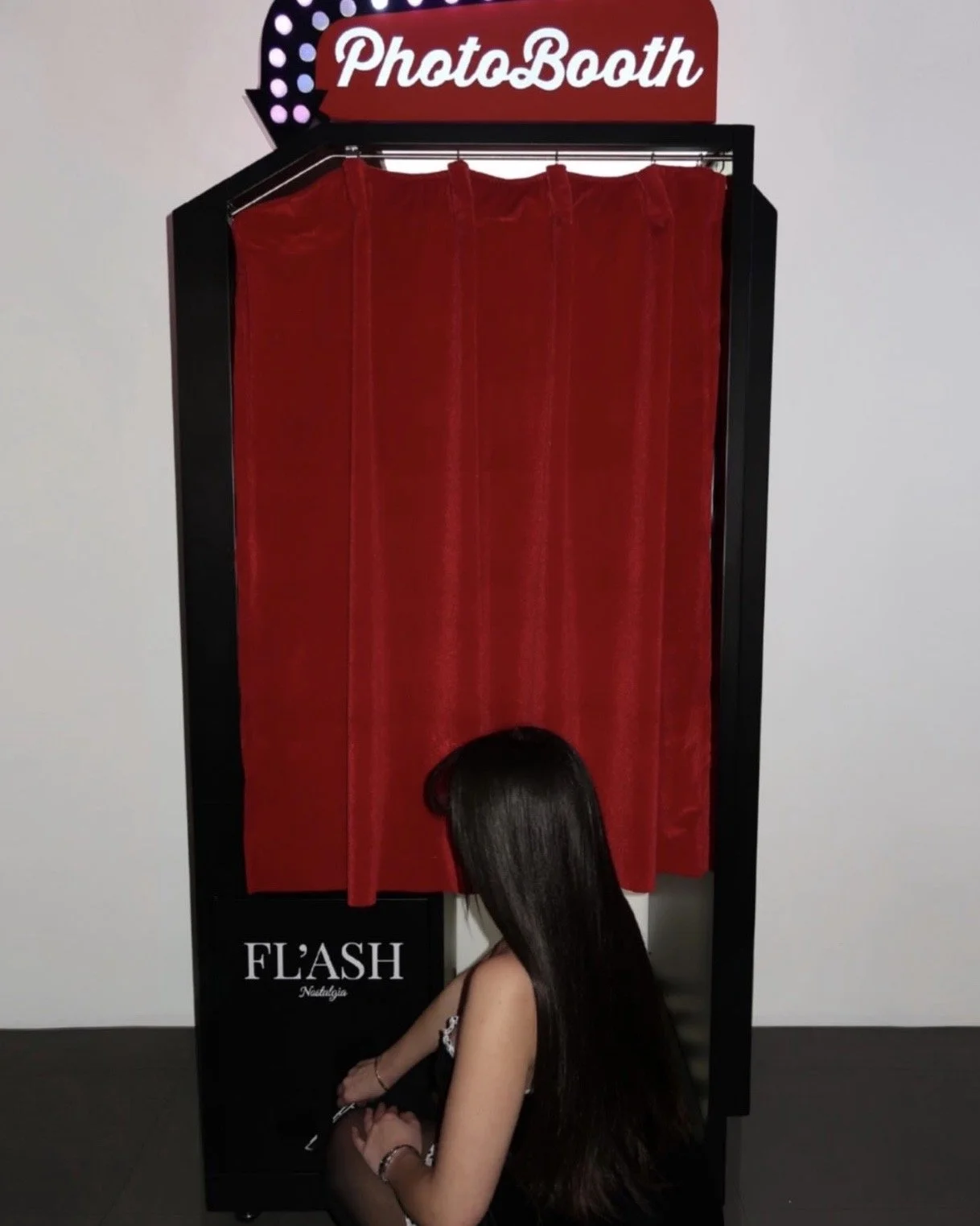 Luxury wedding photo booth rental in Miami. Custom photo strips, unlimited prints, and an enclosed vintage photo booth experience by FL'ASH Nostalgia Booth.
