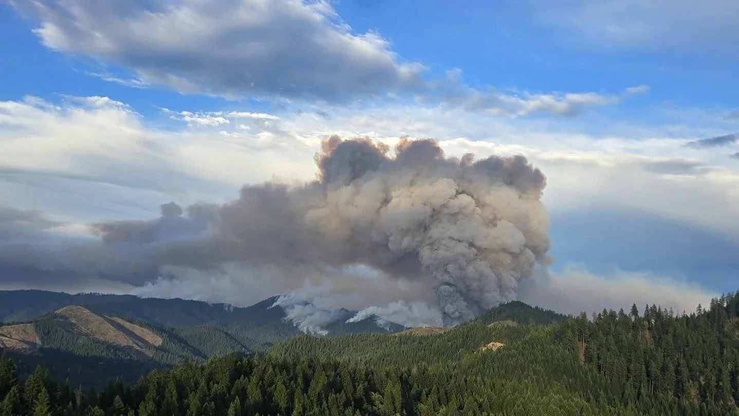 New Spot Fire, Rising Winds Expand Evacuations on East Evans Creek Fire