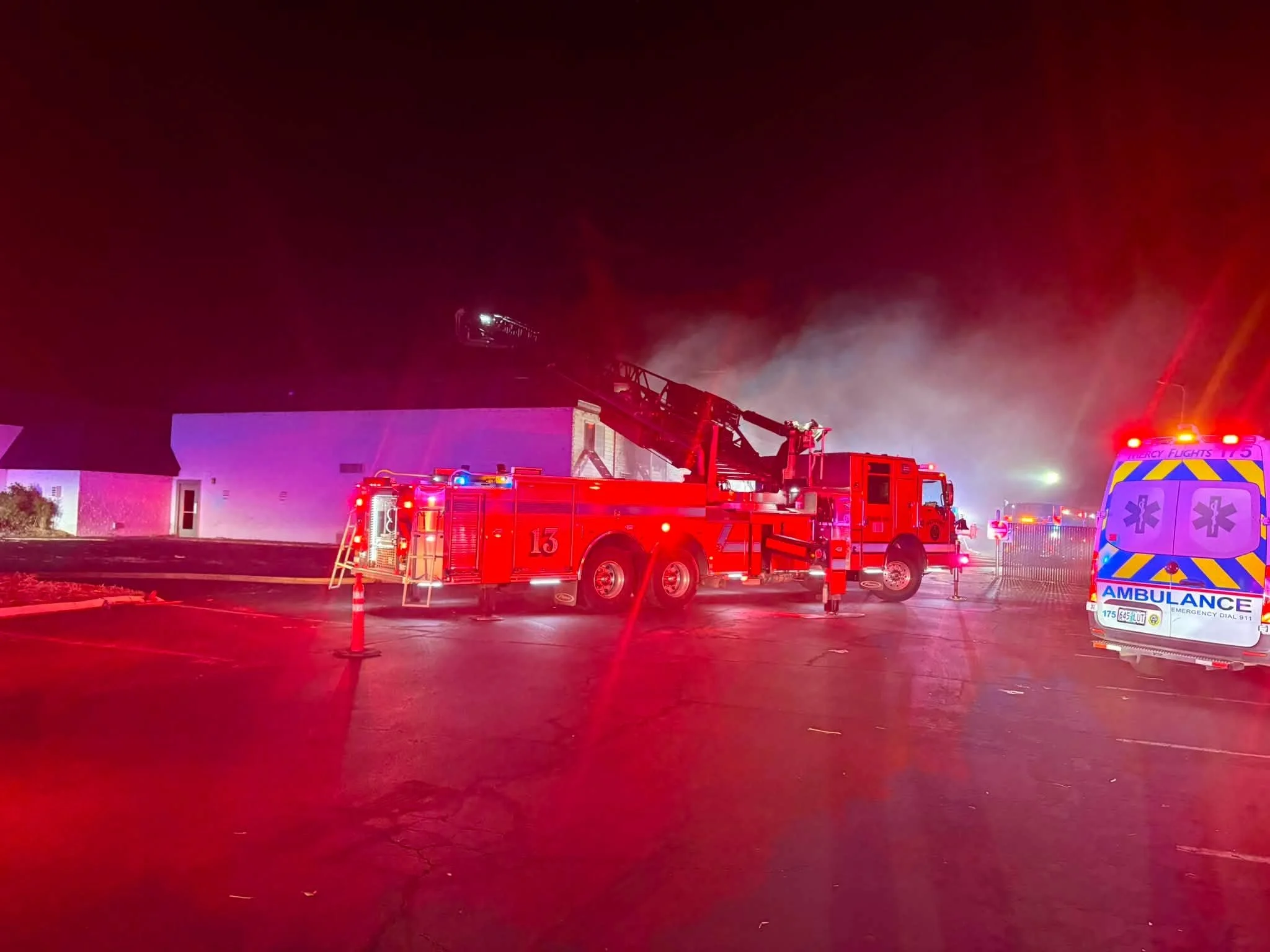   Second-Alarm Response:  Fire crews respond to The Loring Sunday night after flames spread toward the second floor and roofline. One person was transported to the hospital for smoke inhalation.  Medford Fire Department.  
