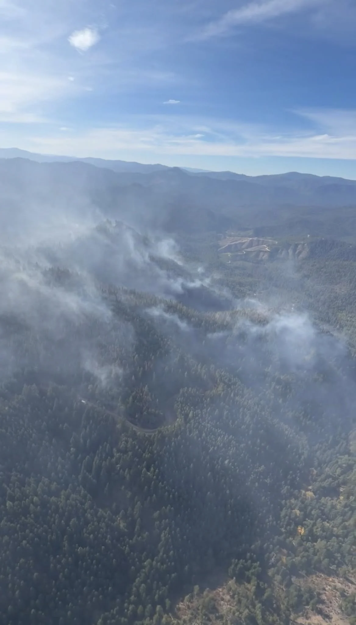  Aerial View:  Light smoke remains visible over the West Fork Evans Creek Fire as crews work deeper into the 283-acre burn area.  Oregon Department of Forestry Southwest Oregon District.  
