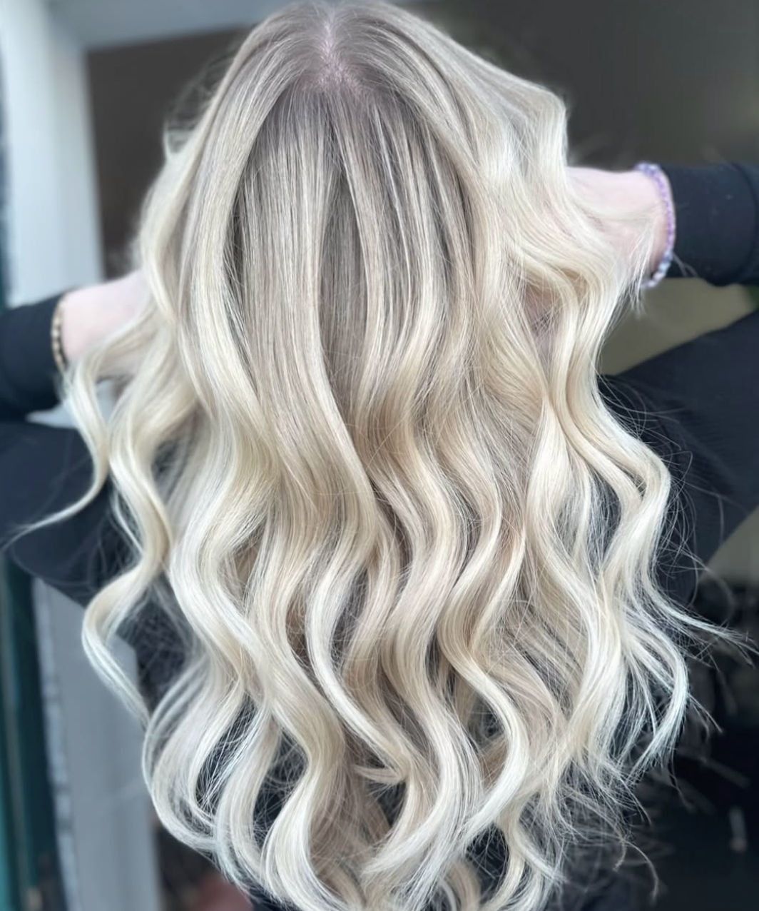 Woman with head full of blonde highlights