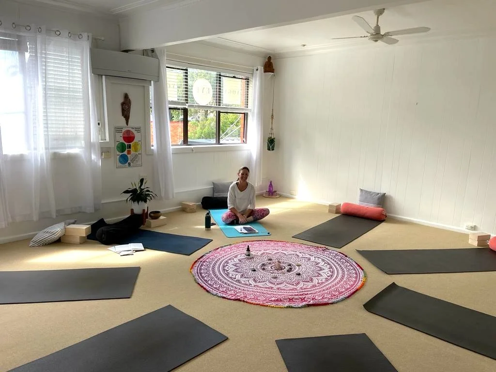 Women gathered in a calming workshop space at Luminousness for a body-led healing and nervous system support session in Sydney, by Nicole Makhudu at Luminousness