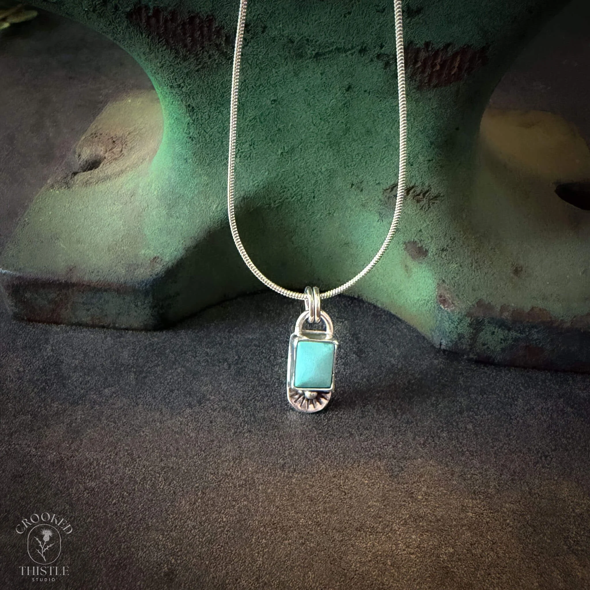 Carico Lake Turquoise Stamped Rectangle Pendant.jpg