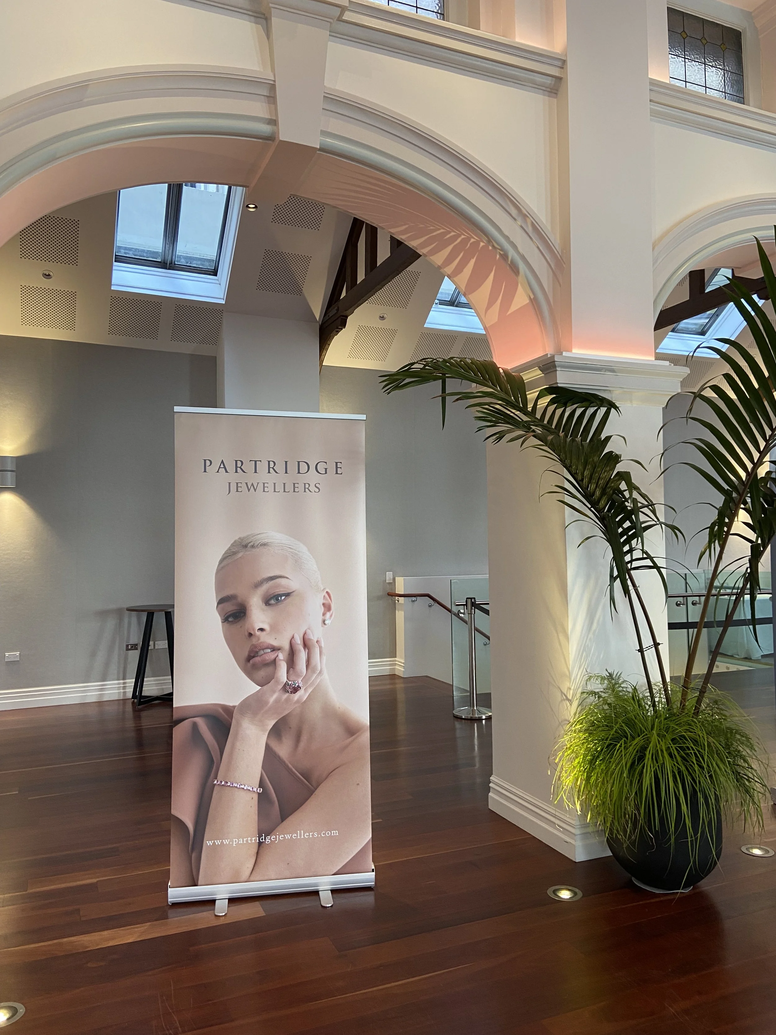 Examples of pull-up banners I designed featuring the Partridge Jewellers logo and bold campaign imagery, created to showcase the jewellery and stand out at events.