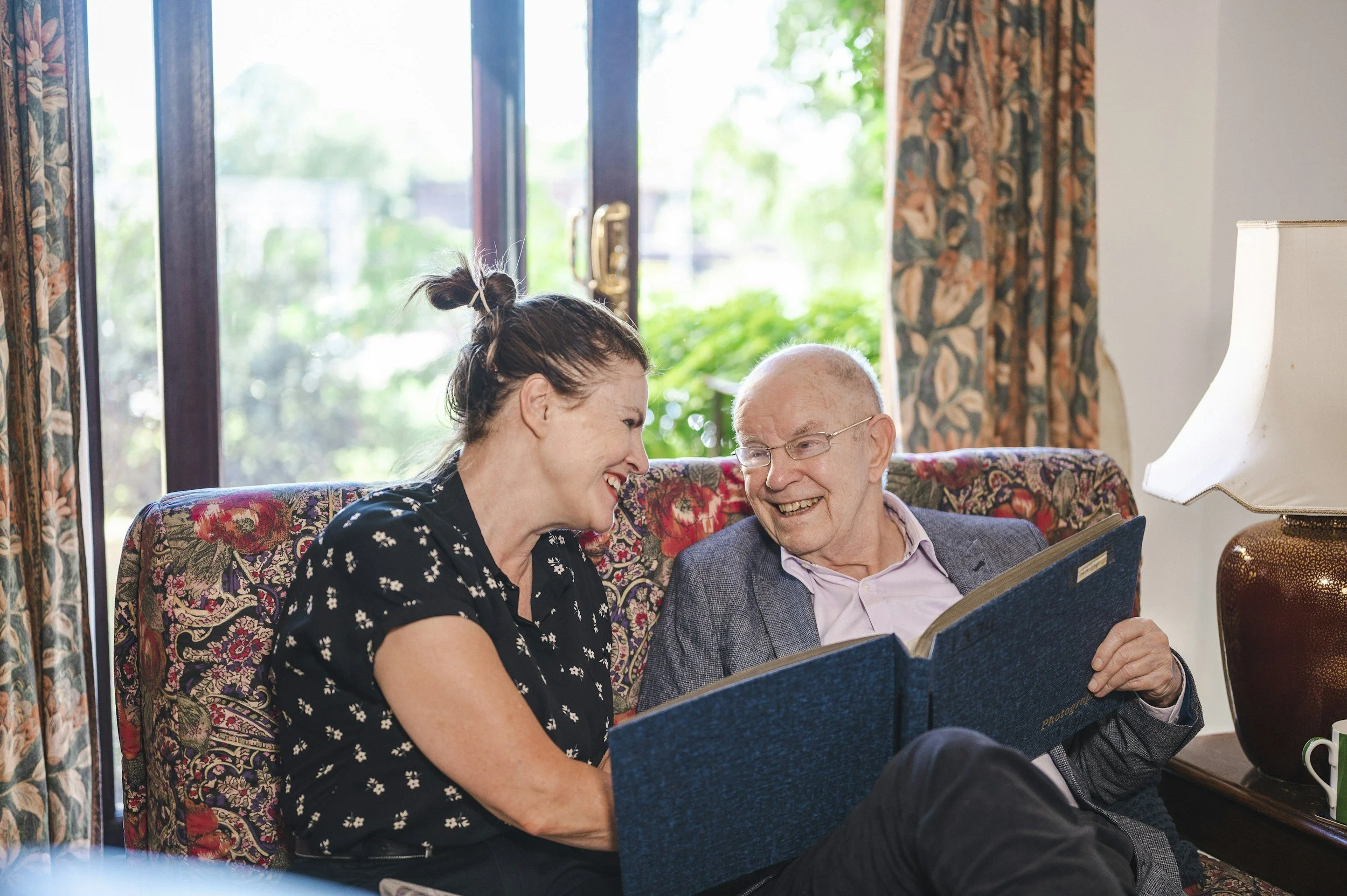 An aged care working alongside a client to provide reliable and compassionate care.