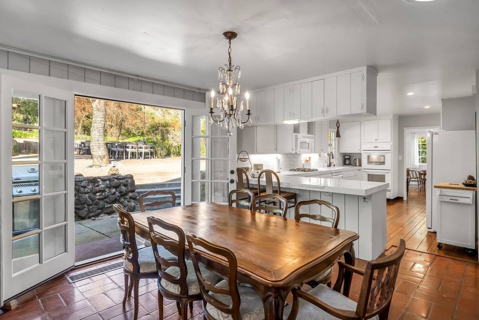 Dining Room to Kitchen. Doors to Patio
