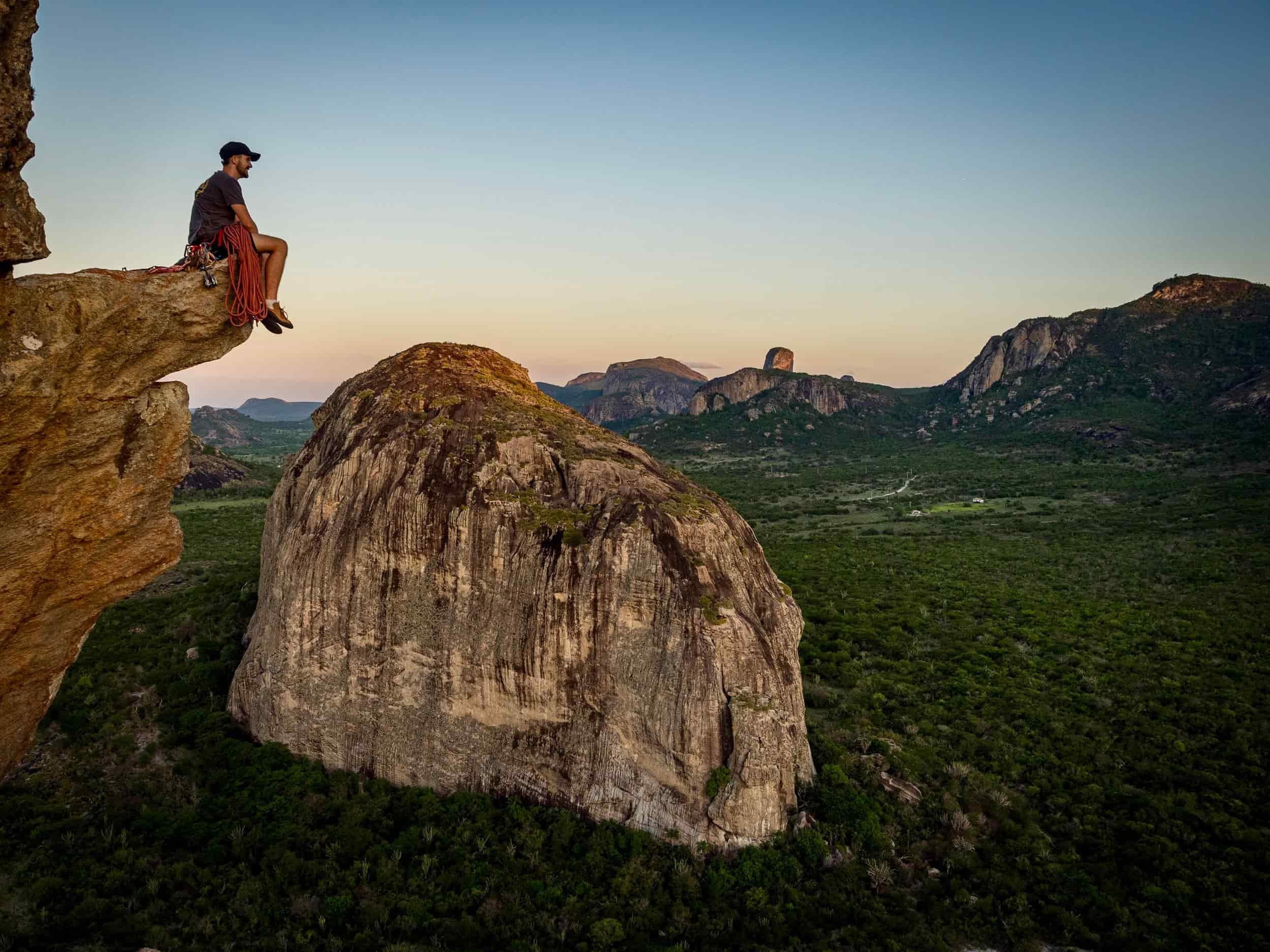 Summit Regional founder during a remote climbing expedition in rugged mountain terrain