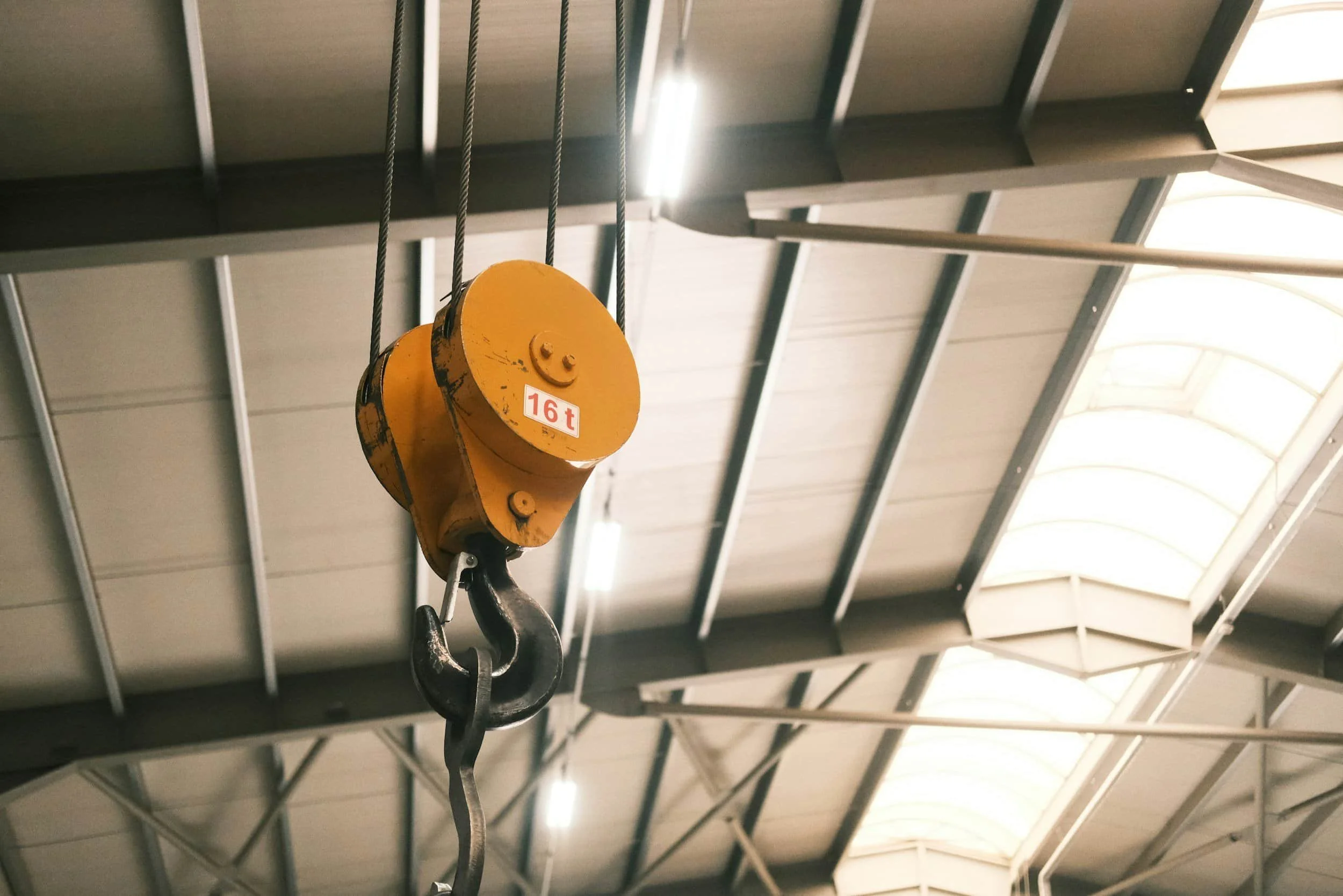 Electric chain hoist installed inside industrial workshop