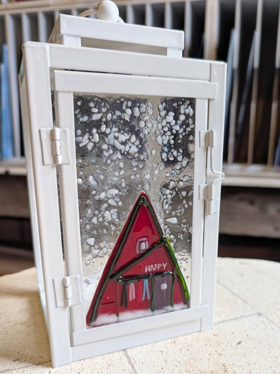 A small piece of Hatcher Pass, captured in glass.

This thrifted lantern now holds Cabin No. 10, or as I refer to it "the Happy Cabin" of Hatchers Pass Lodge. Set in winter and fused on clear panes like a quiet little snow globe. Nostalgic 
