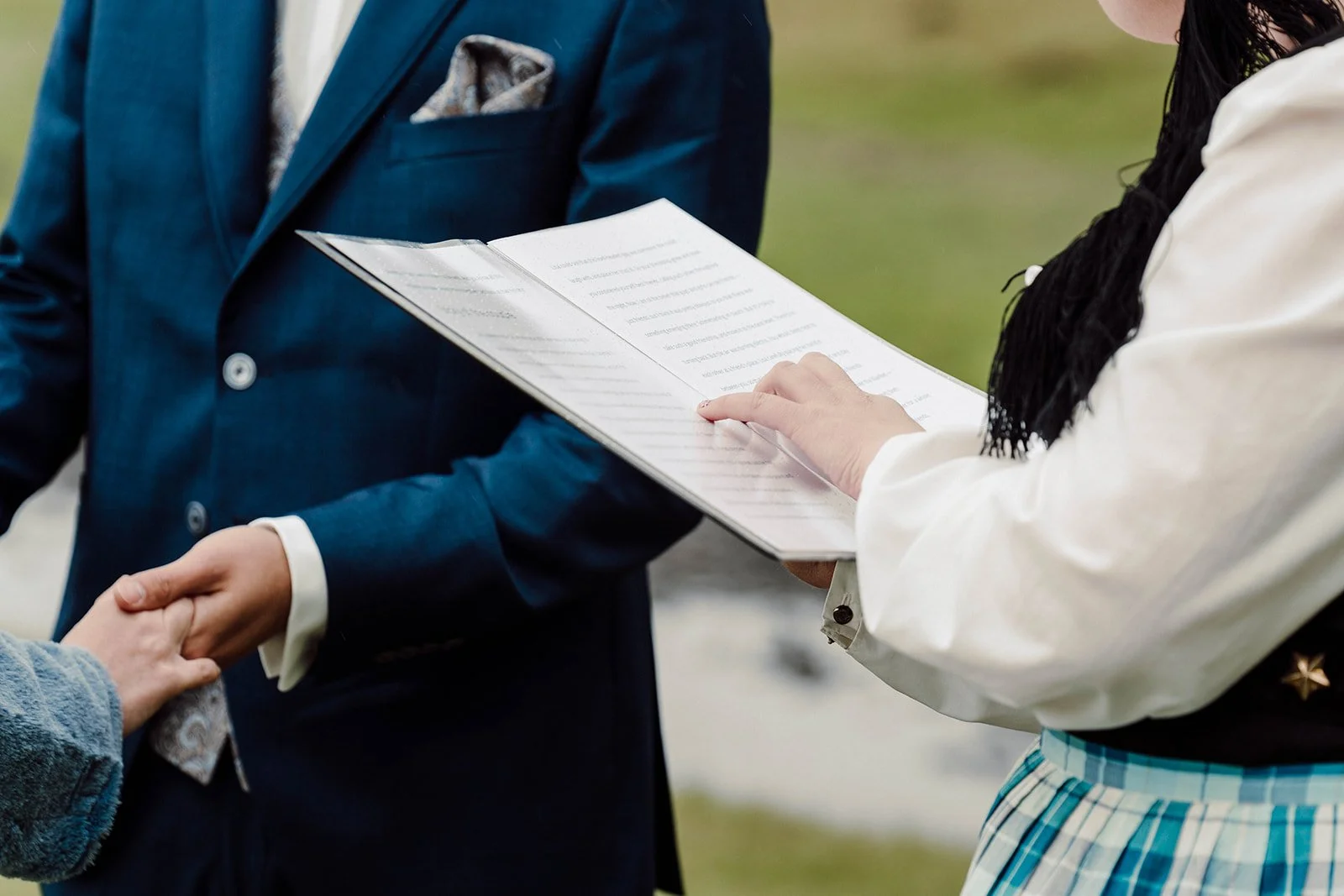 iceland-elopement-ceremony-vows-reading-close-up-details-kamil-grygo.jpg.jpg