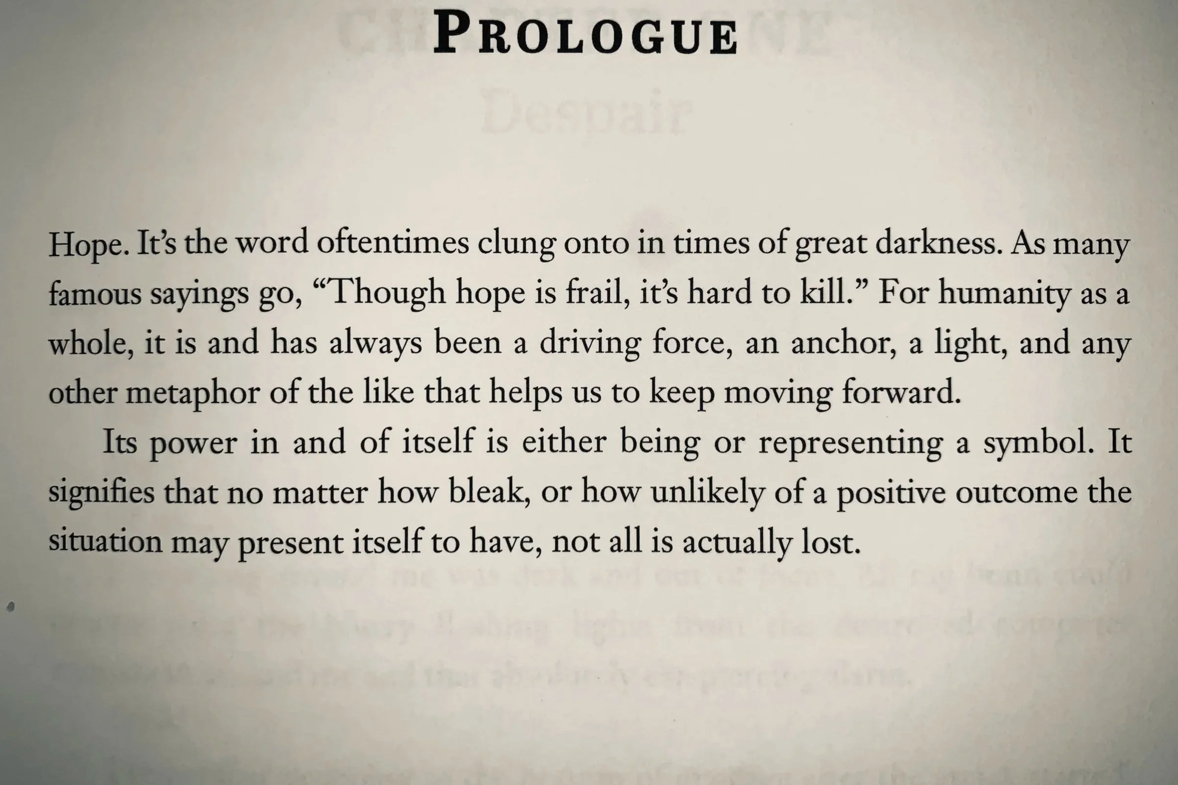 Prologue from a book titled 'X: From Ashes We Rise' with text discussing hope, its significance during dark times, and its symbolism and power.