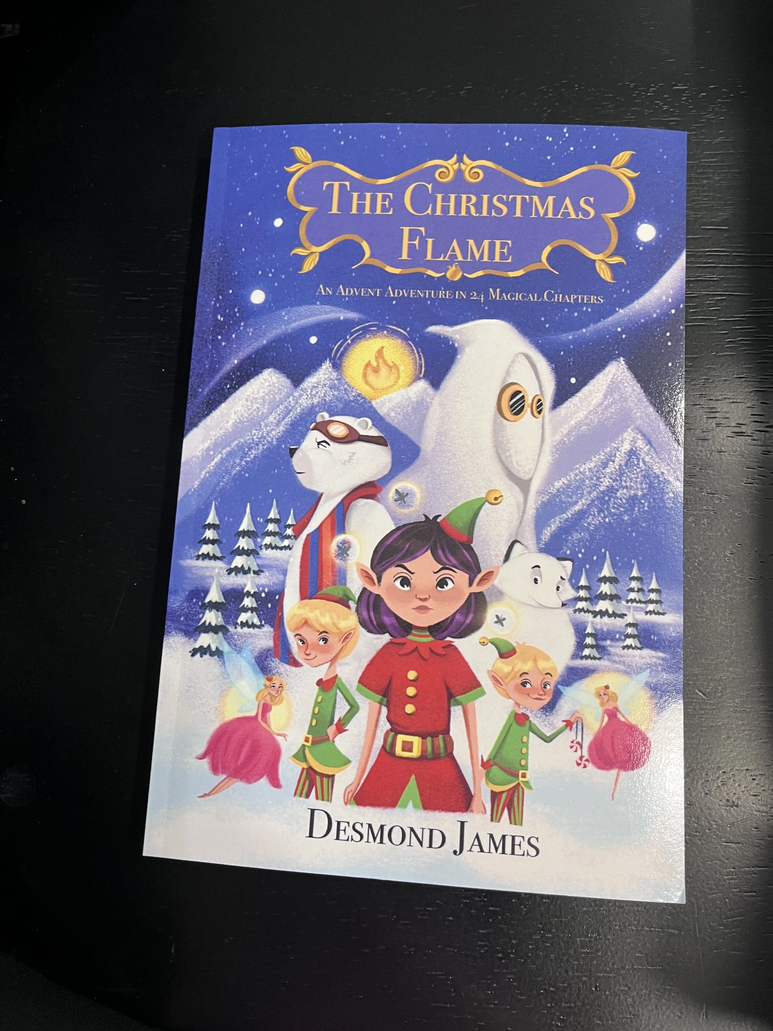 The Christmas Flame - Paperback edition with 24 B&W spot illustrations