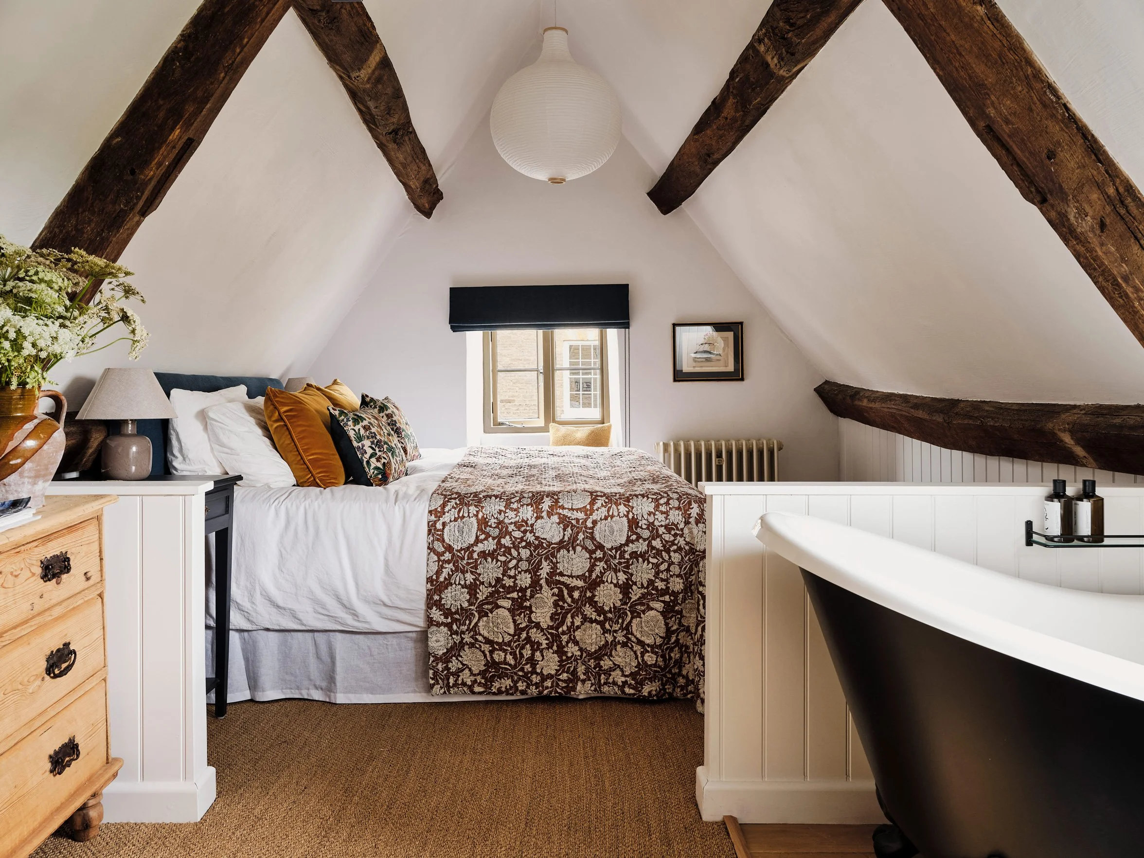 A Cotswolds cottage bedroom designed by Imperfect Interiors and painted in Imperfect Interiors x Pilgrim Porridge