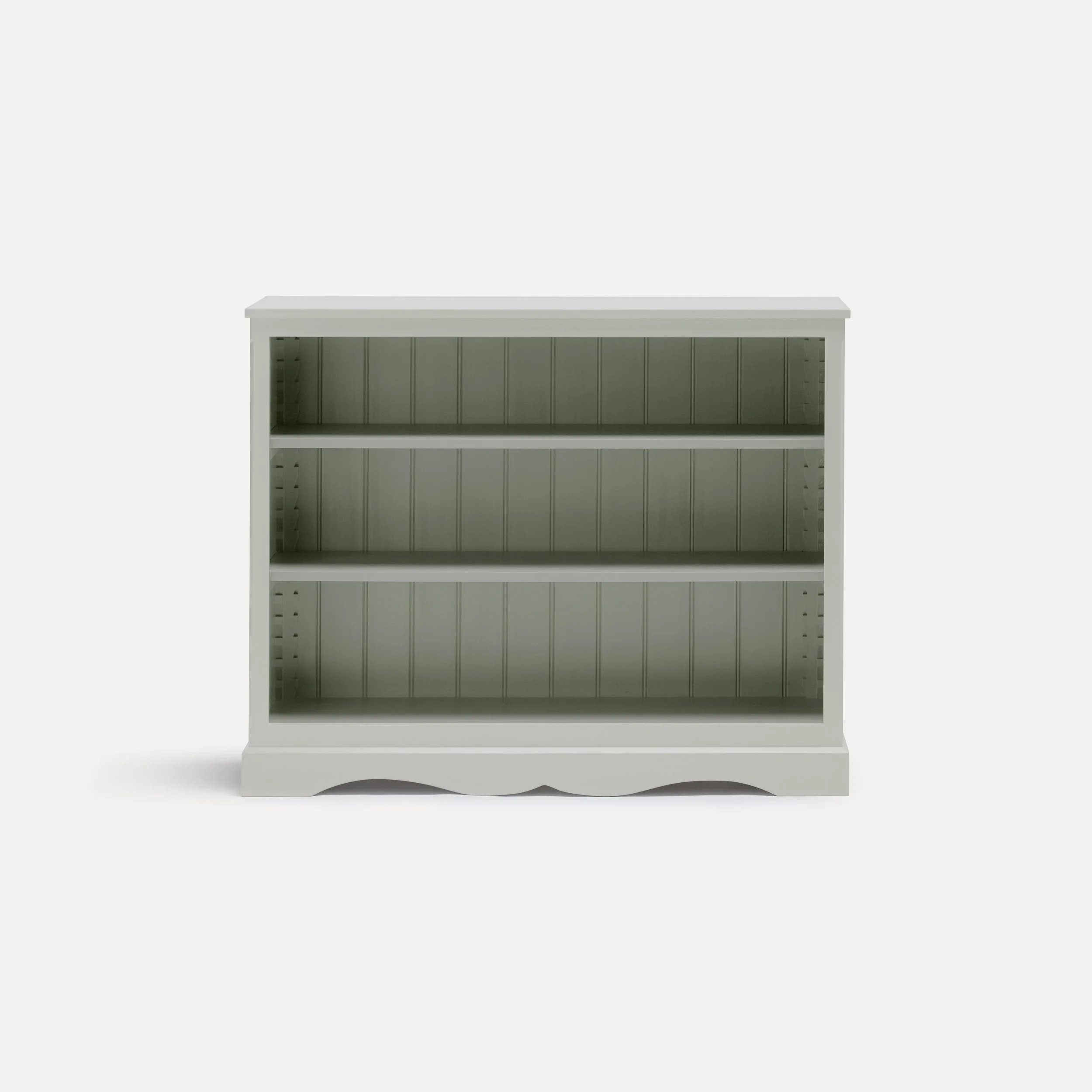 Gustavian style semi bespoke hand painted traditional wooden bookcase designed by Imperfect Interiors and Pilgrim House