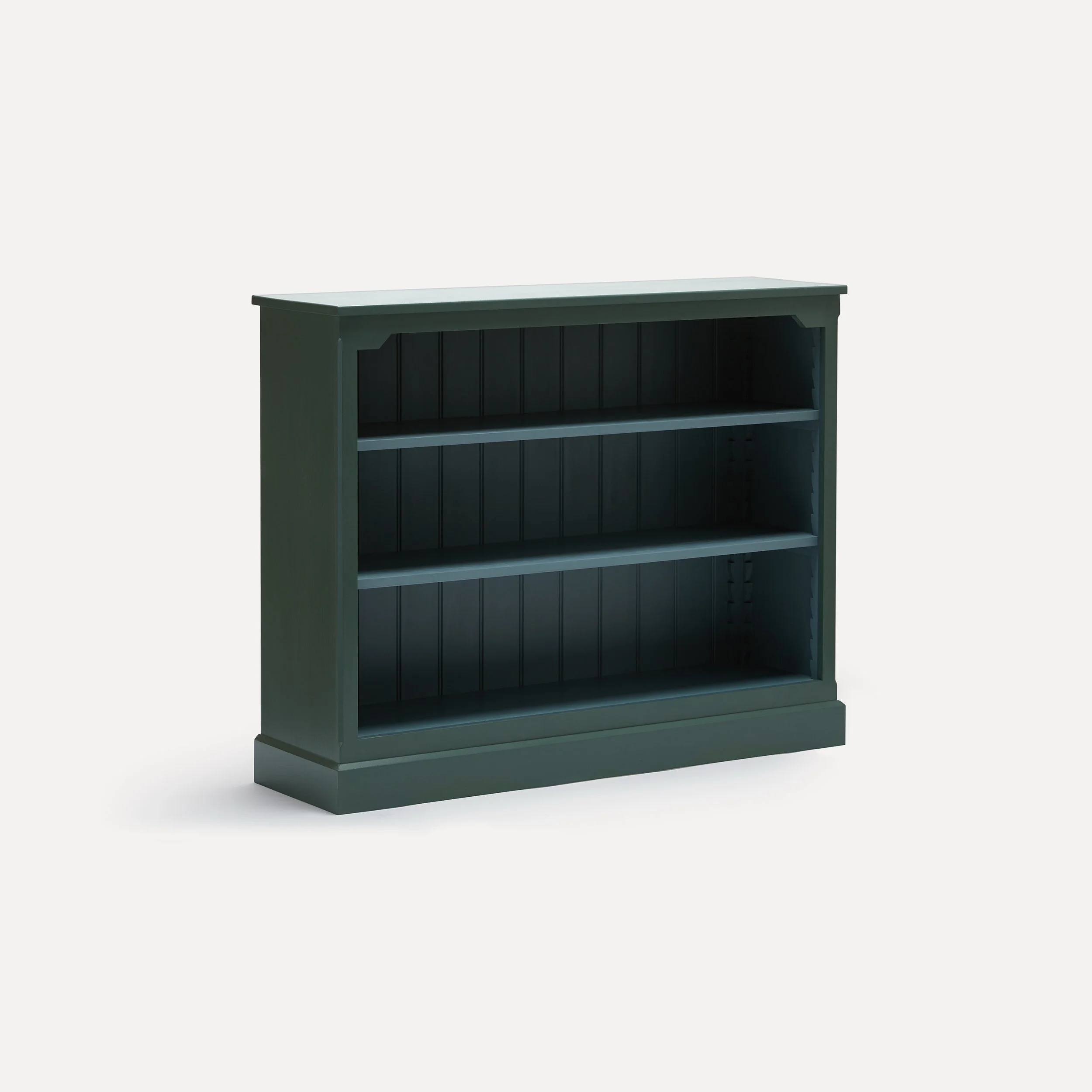 Rustic style semi bespoke hand painted traditional wooden bookcase designed by Imperfect Interiors and Pilgrim House