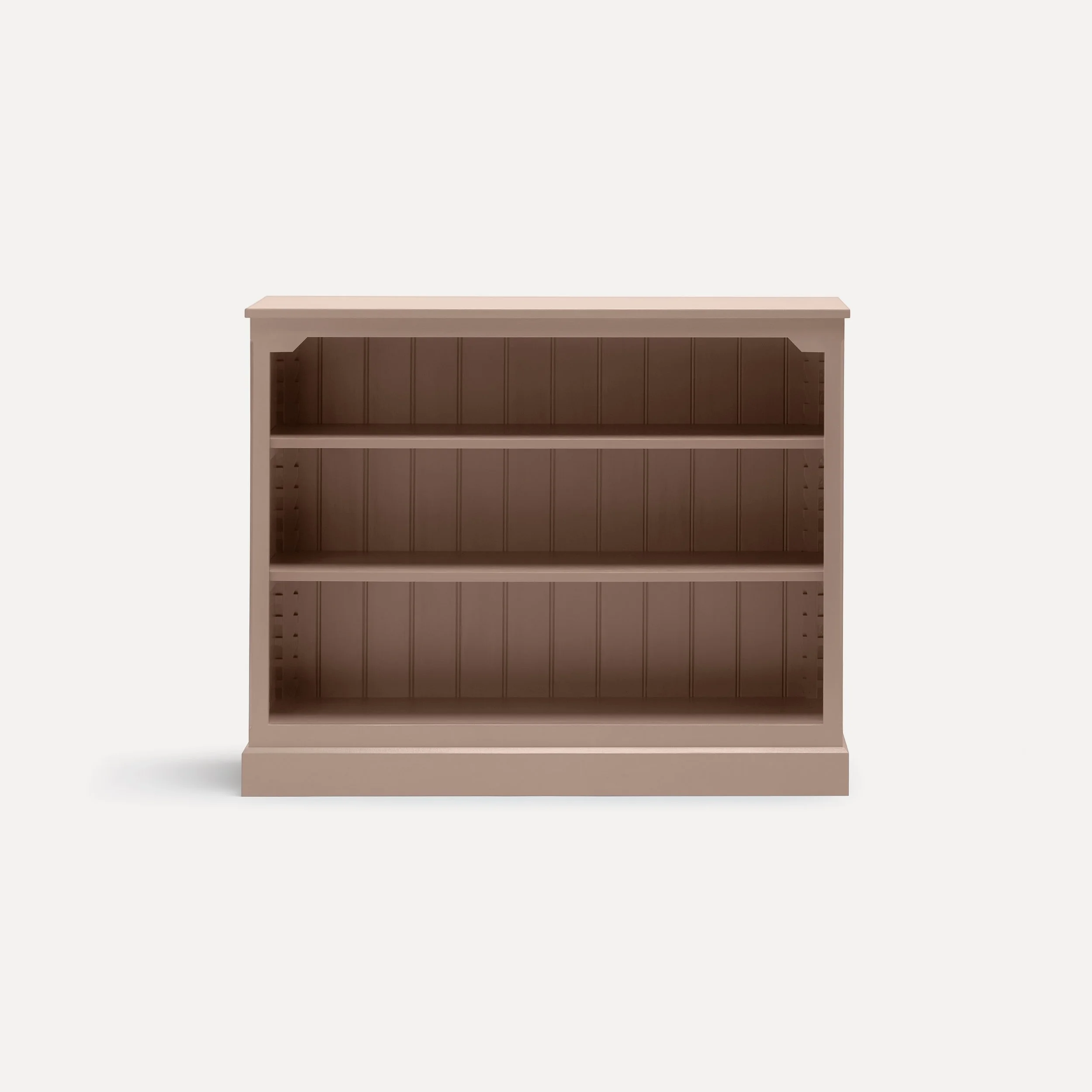 Rustic style semi bespoke hand painted traditional wooden bookcase designed by Imperfect Interiors and Pilgrim House