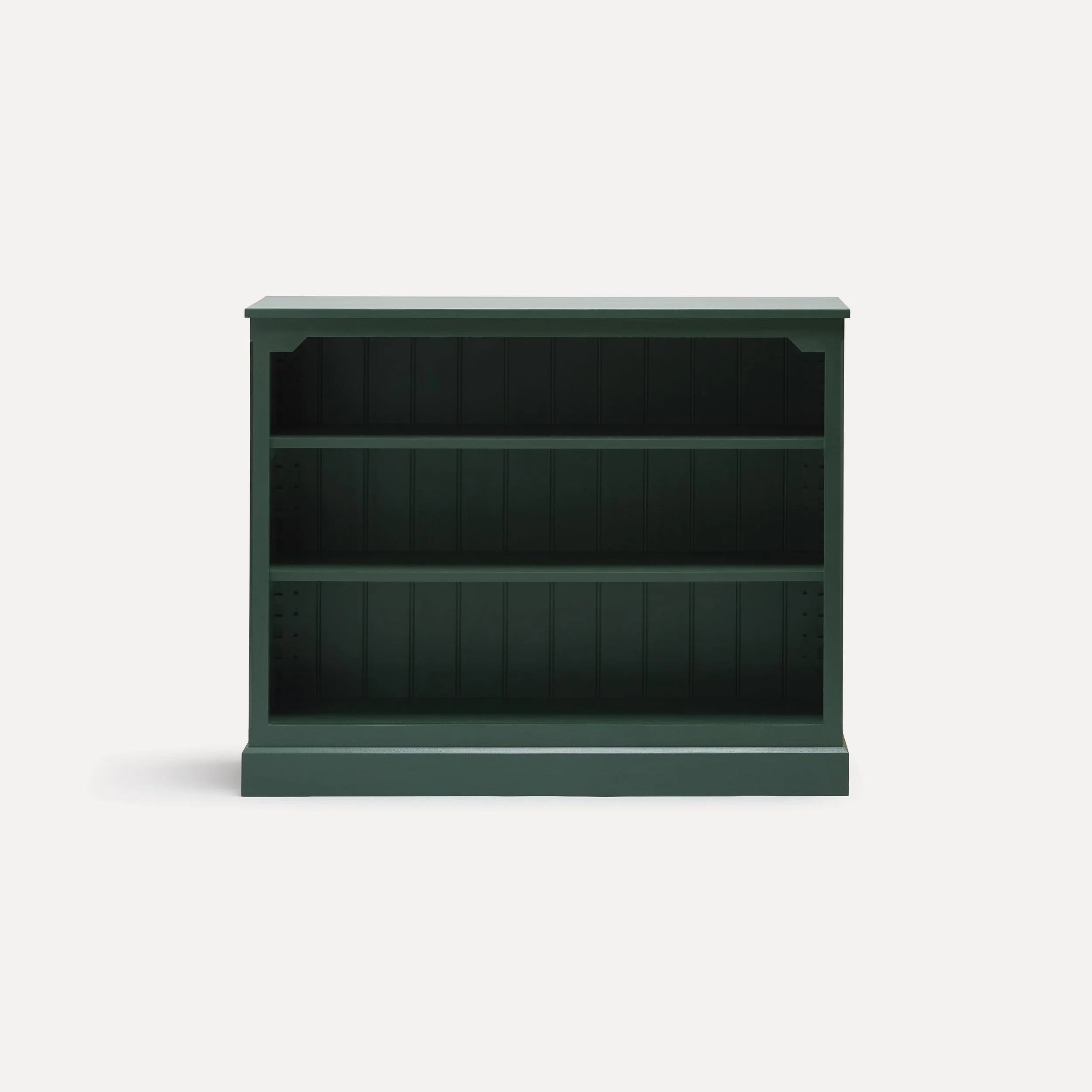 Rustic style semi bespoke hand painted traditional wooden bookcase designed by Imperfect Interiors and Pilgrim House