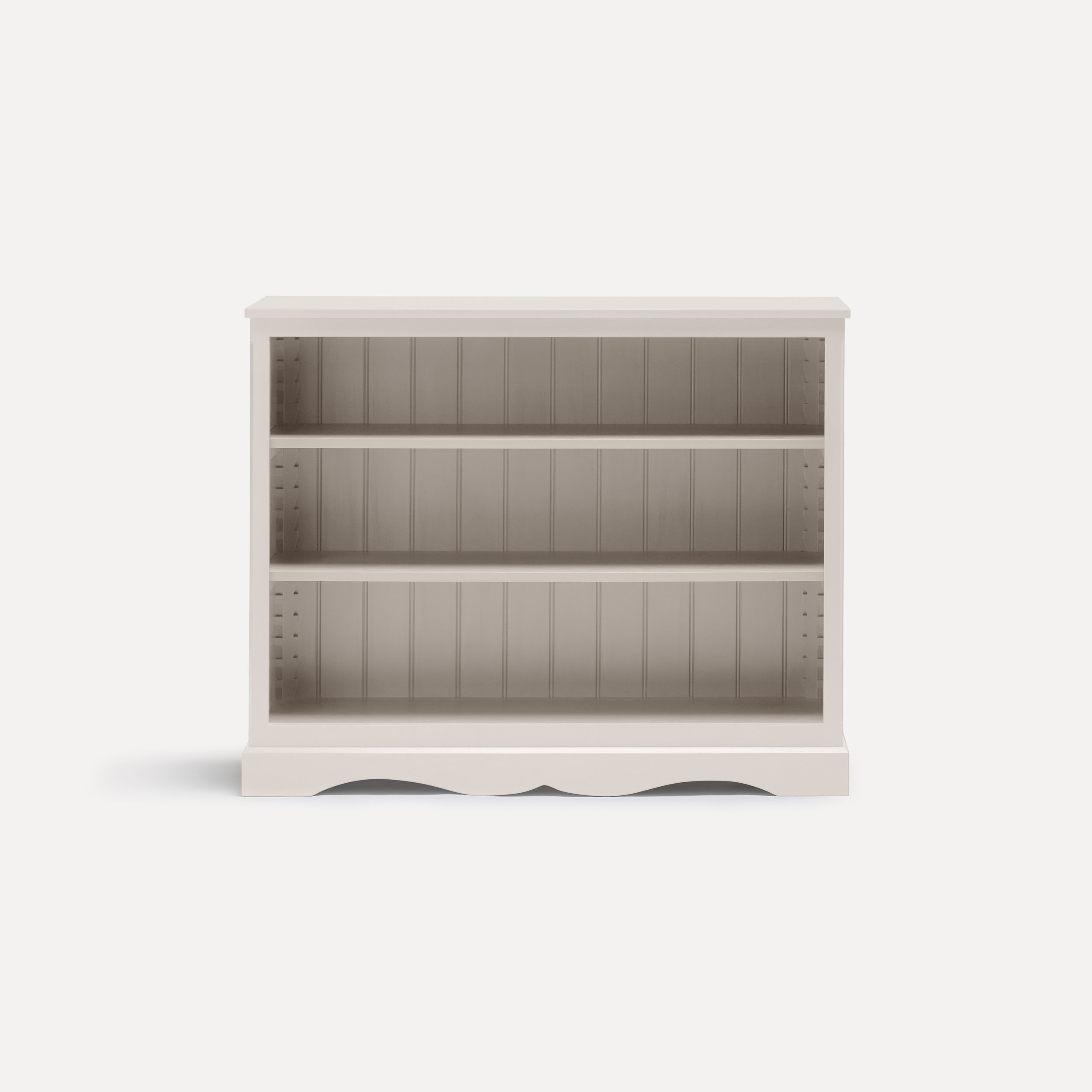 Gustavian style semi bespoke hand painted traditional wooden bookcase designed by Imperfect Interiors and Pilgrim House