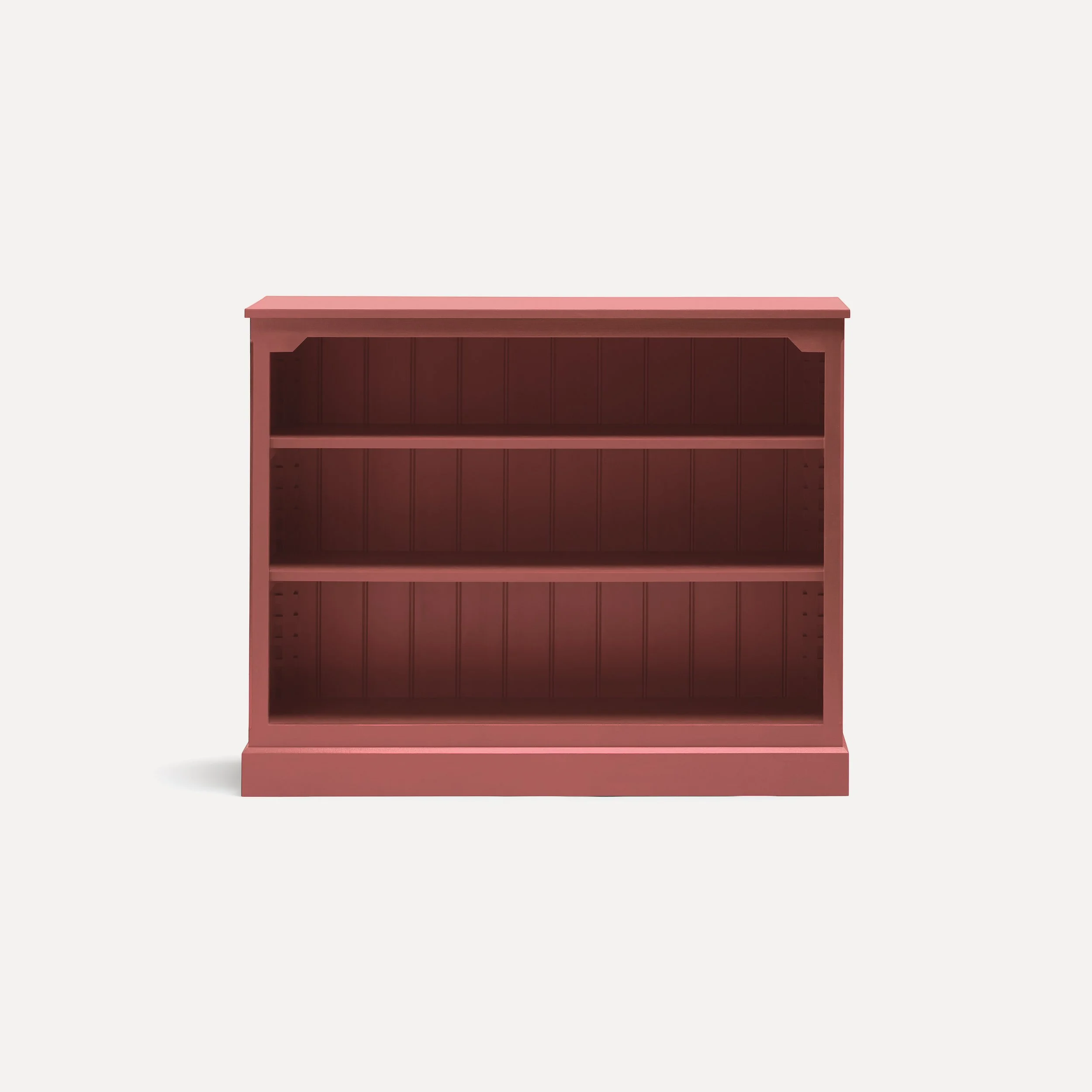 Rustic style semi bespoke hand painted traditional wooden bookcase designed by Imperfect Interiors and Pilgrim House