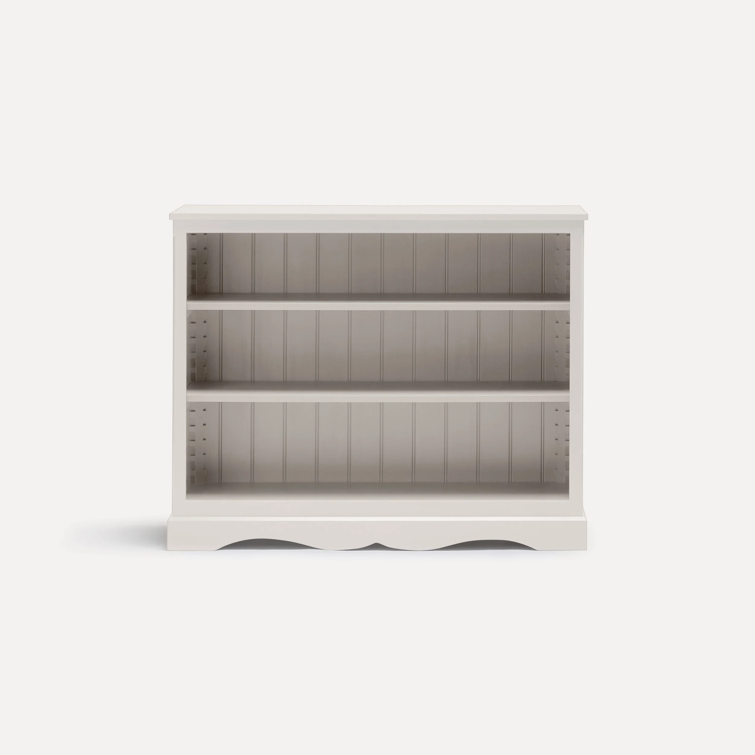 Gustavian style semi bespoke hand painted traditional wooden bookcase designed by Imperfect Interiors and Pilgrim House