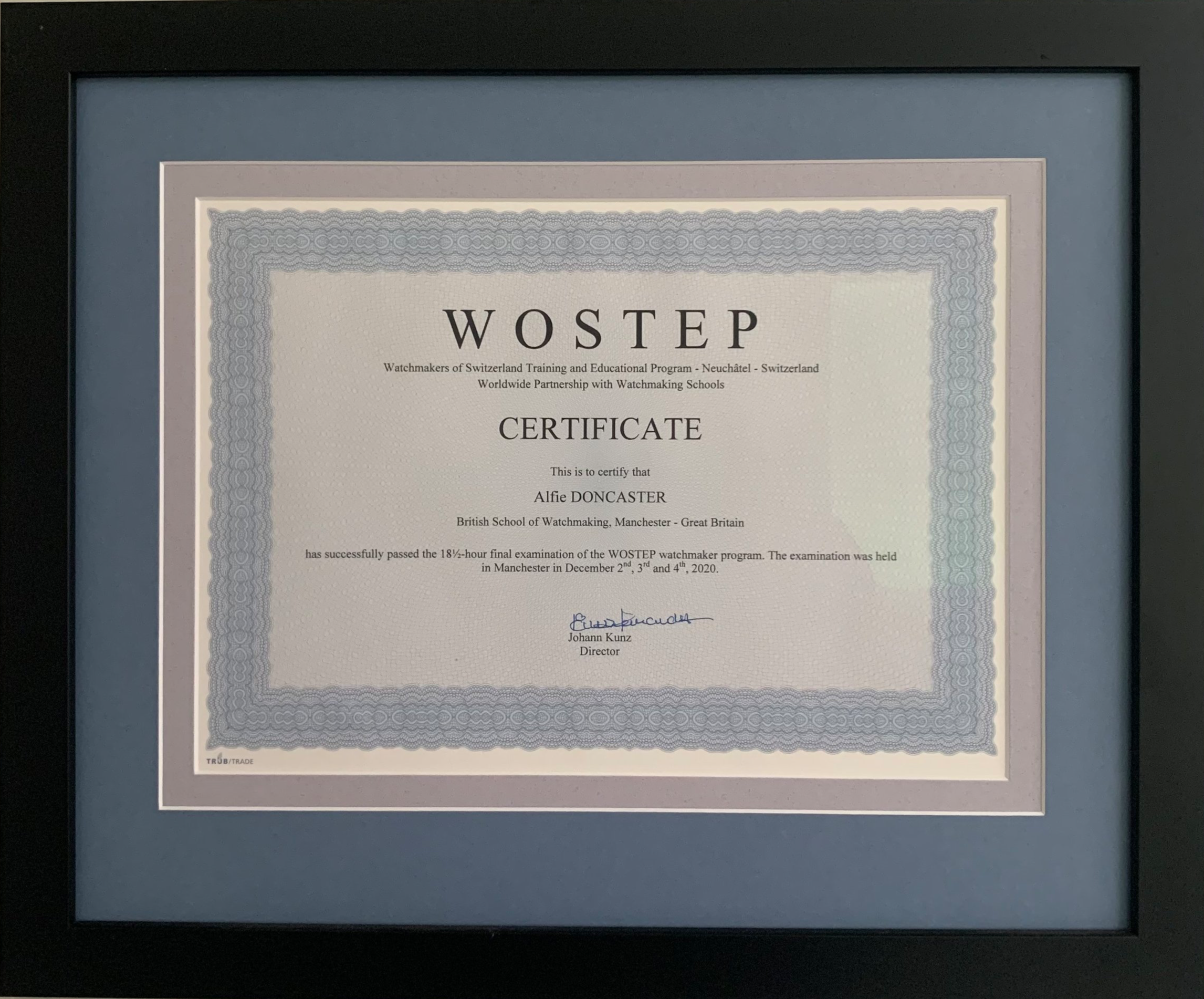 Framed certificate from WOSTEP awarded to Alfie DONCASTER by the British School of Watchmaking, dated December 2020.