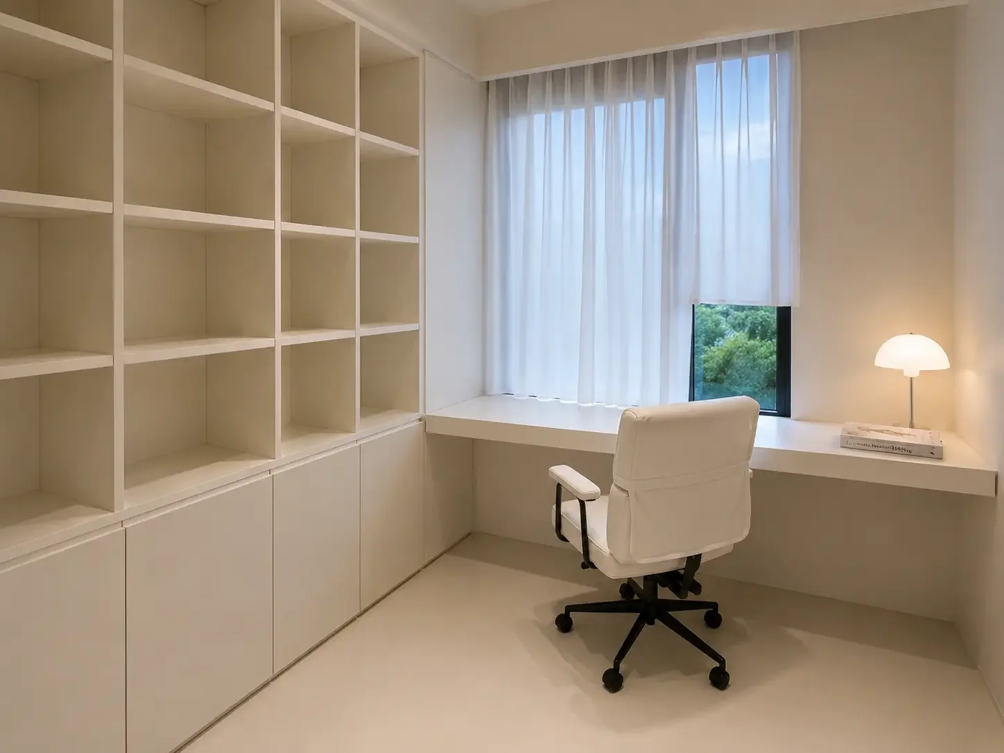 Study room in a Singapore apartment with seamless light microcement floor and wall surfaces.
