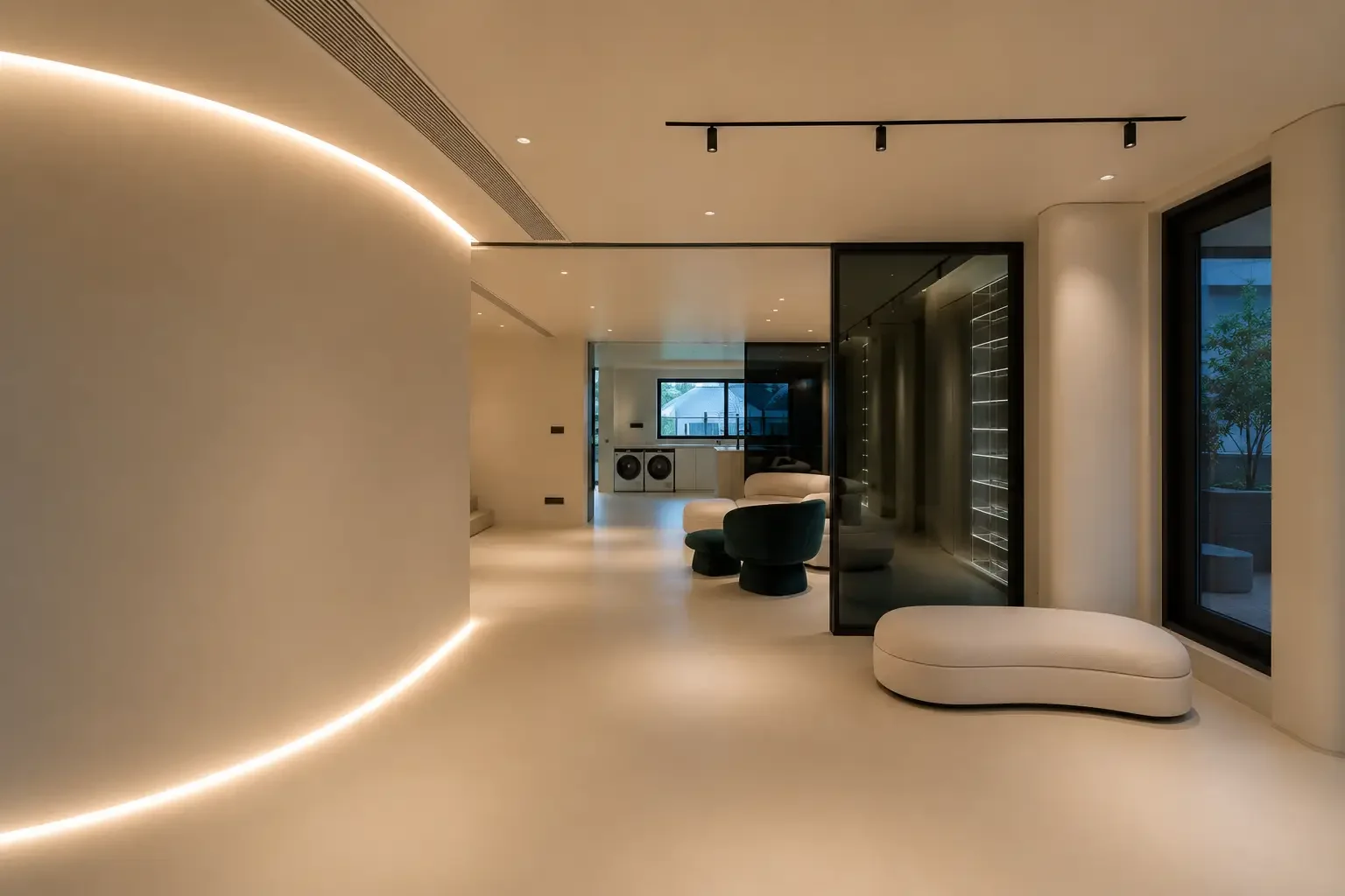Curved feature wall with seamless microcement surfaces in a Singapore apartment interior.