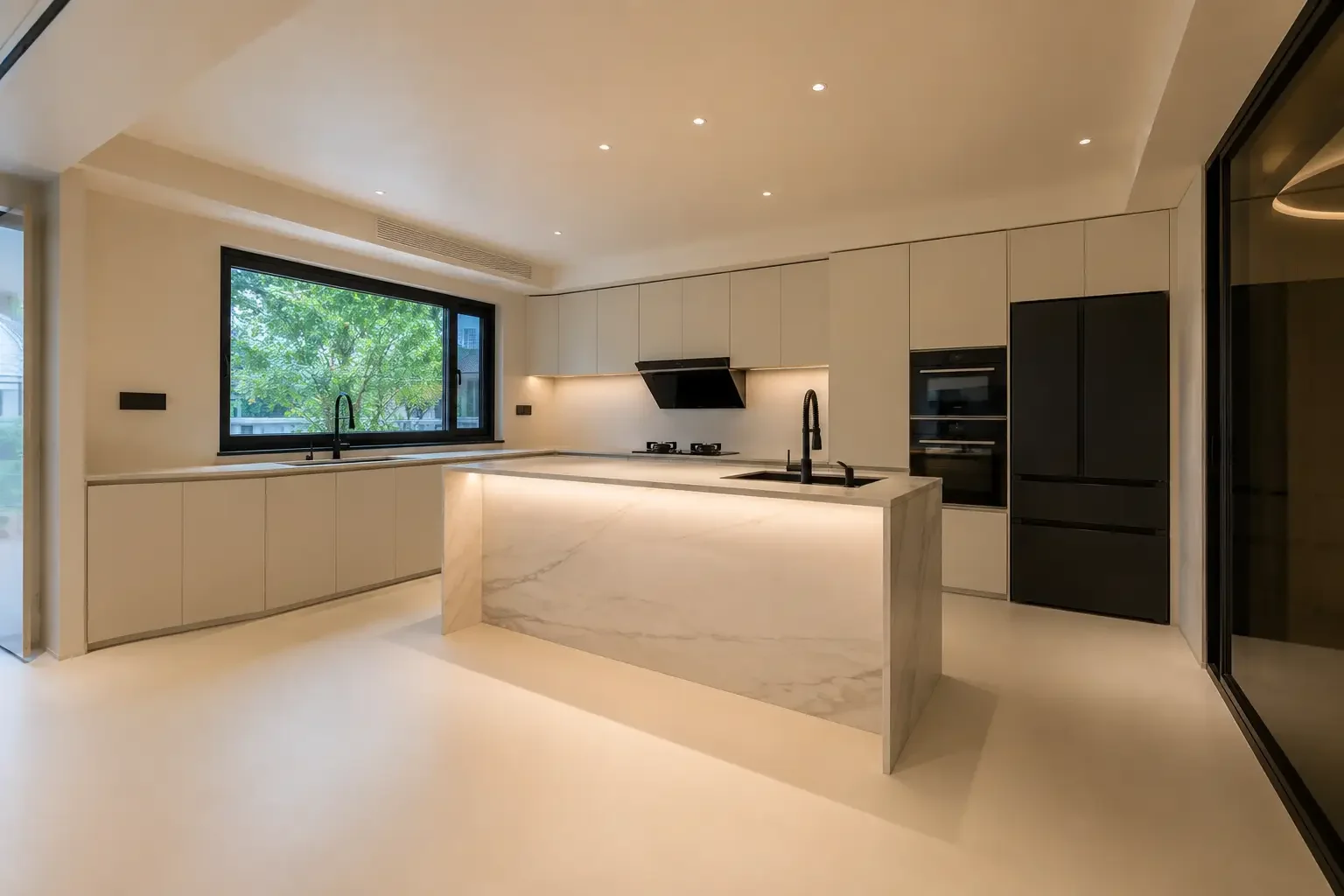 Singapore apartment kitchen with seamless microcement floor and warm neutral interior finish.