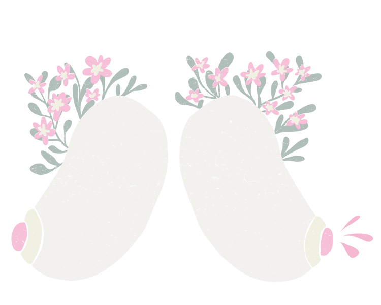 Two white slippers decorated with pink flowers and green leaves, viewed from above.