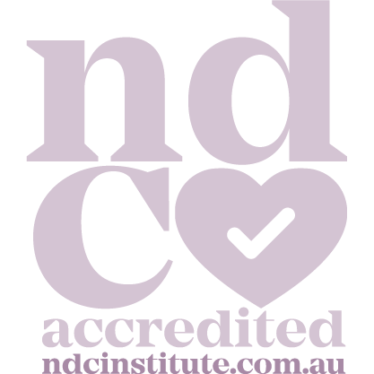 Purple graphic with large bold text saying 'NDC accredited', a heart with a check mark inside