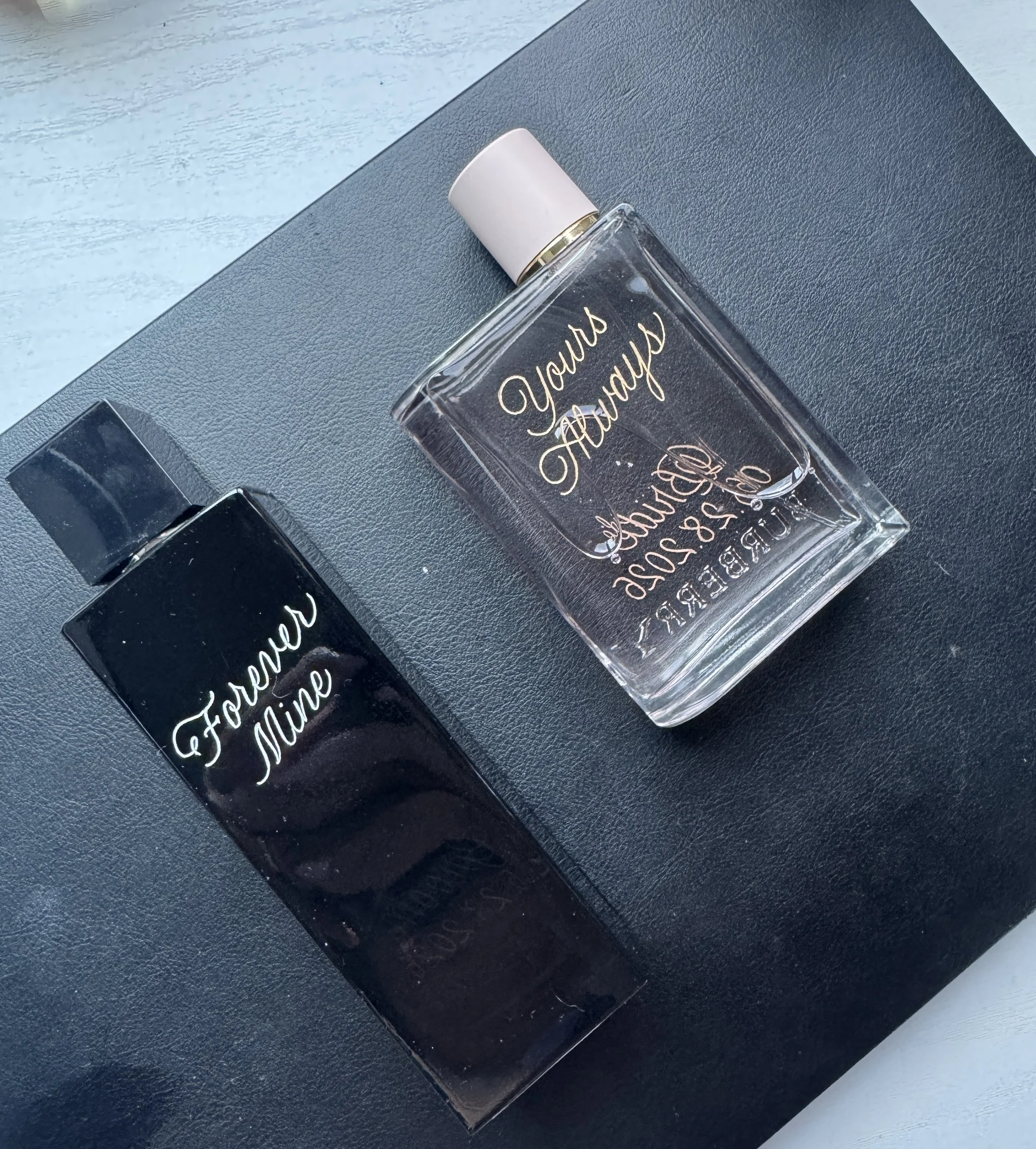 his and hers engraved perfumes with "forever mine" on his and "yours always" on hers. YSL and burberry.