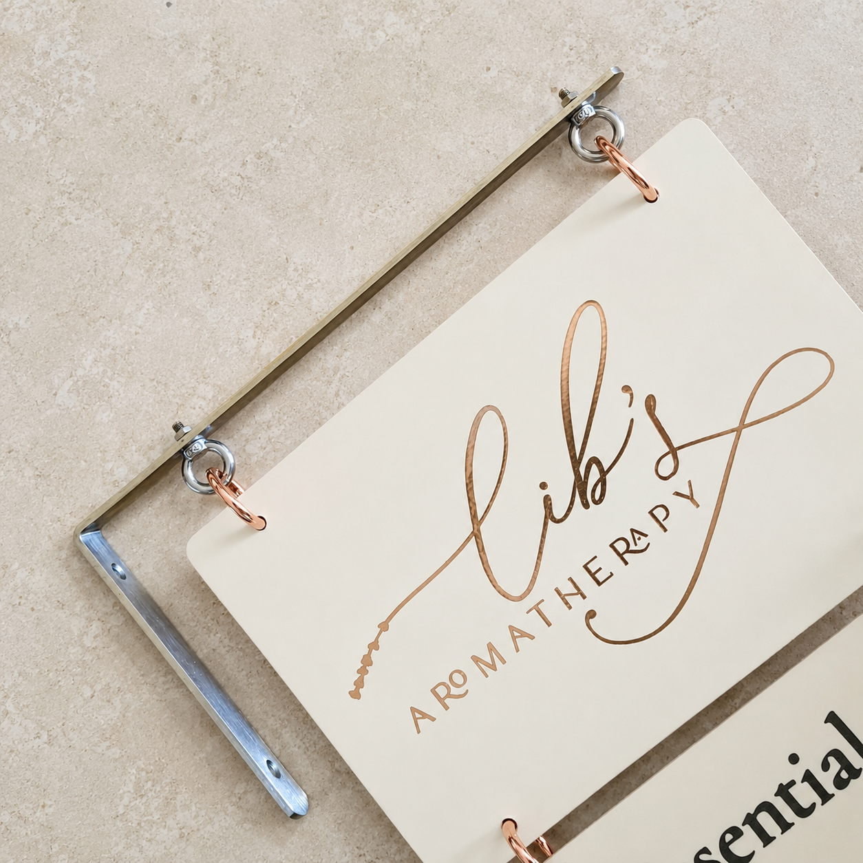 interchangeable-market-sign-bracket-stone-background.png