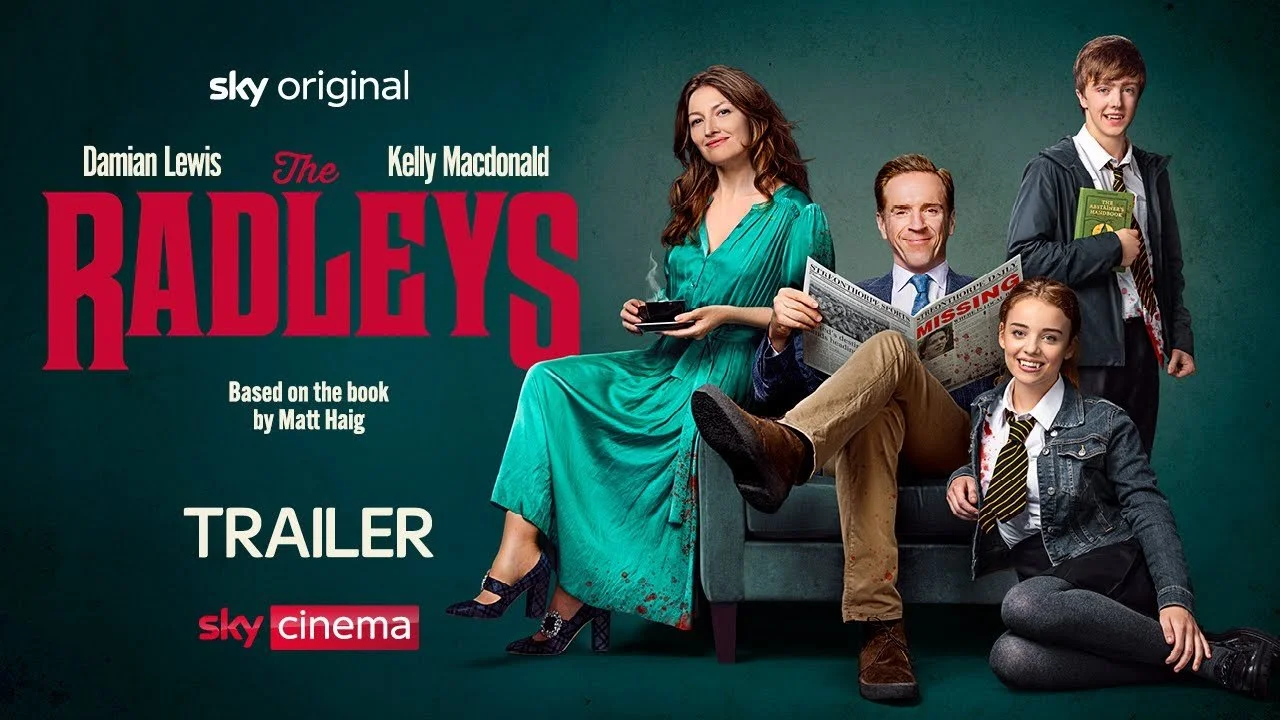 Promotional poster for the TV series 'The Radleys,' featuring four characters sitting and standing with a dark background, including a woman in a teal dress, a man in a beige suit, a teenage boy in a hoodie, and a young girl in casual clothing, all smiling or posing.