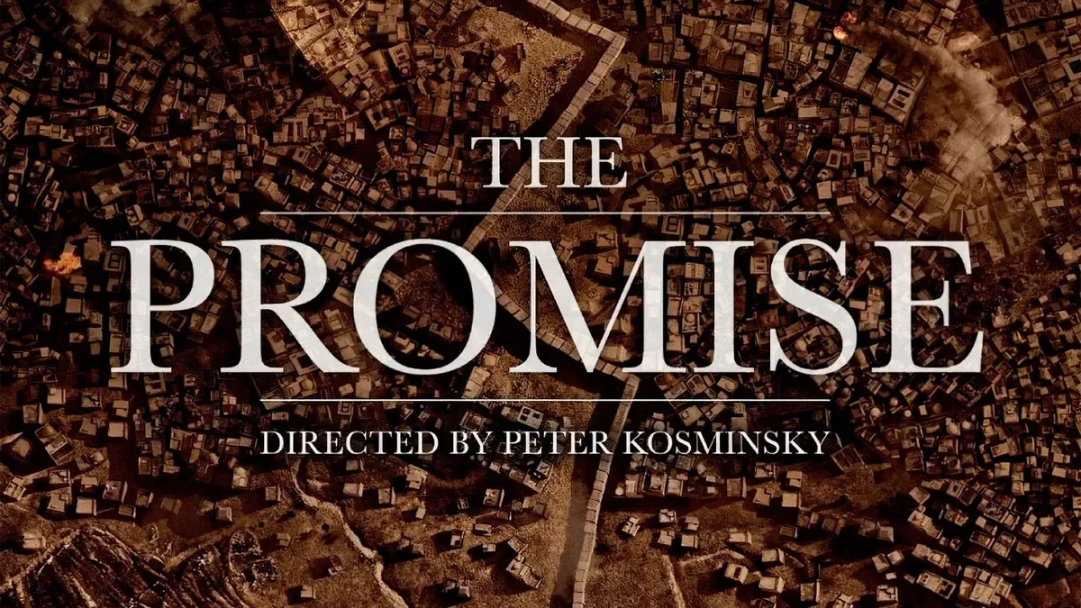 Title screen for 'The Promise,' directed by Peter Kosminsky, with an aerial view of a densely packed city with numerous small buildings and a winding road.