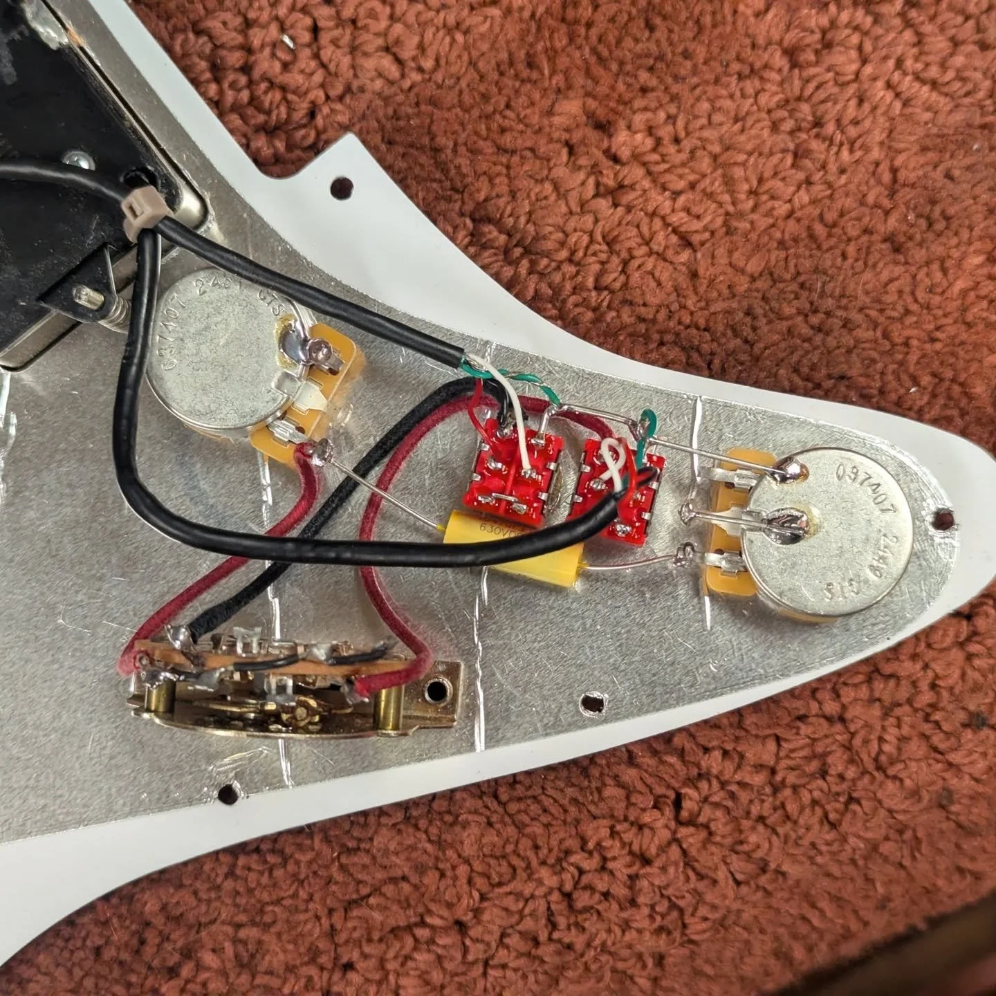 Quick strat wire up with 2 humbuckers, 2 series/parallel switches, volume, tone.