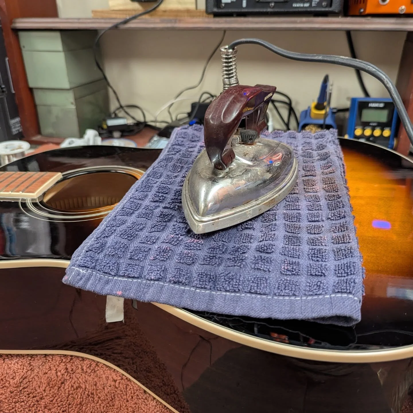 Did a bridge reset on this Epiphone for the HFL highschool music department today!