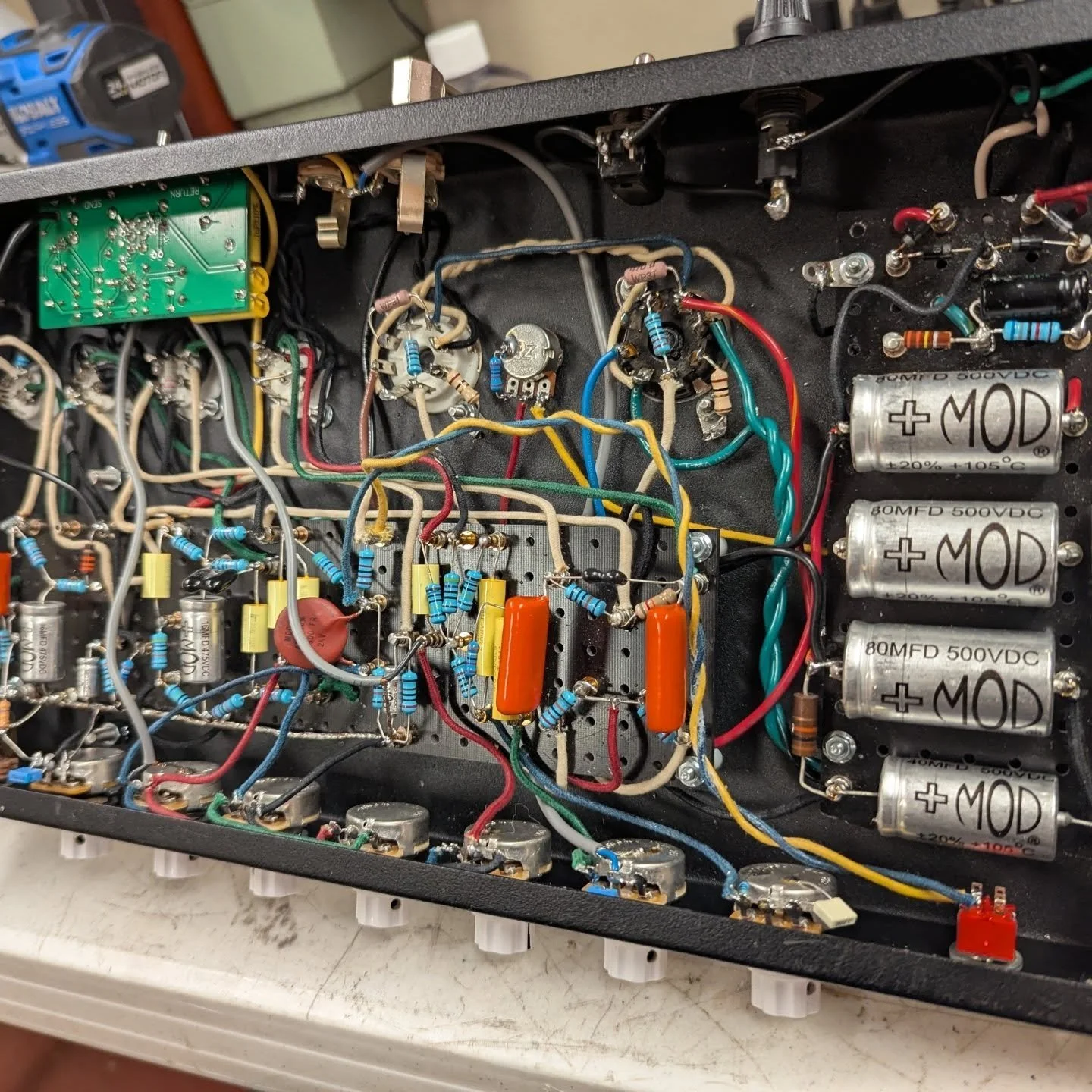 Amp build is finally done. it's the first one that I've done everything 100% by hand from scratch (Except the effects loop). Built the turret boards, drilled out the chassis, did everything the hard way.  This was definitely a massive learning experi