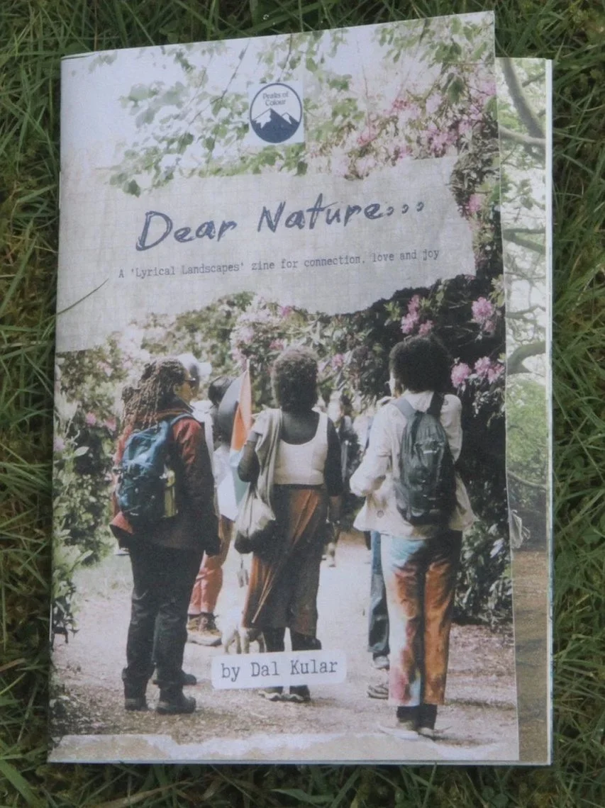 Cover of a zine titled "Dear Nature" with a subtitle "A 'lyrical' landscapes' zine for connection, love and joy" and a photograph of people walking on a trail surrounded by blooming trees.