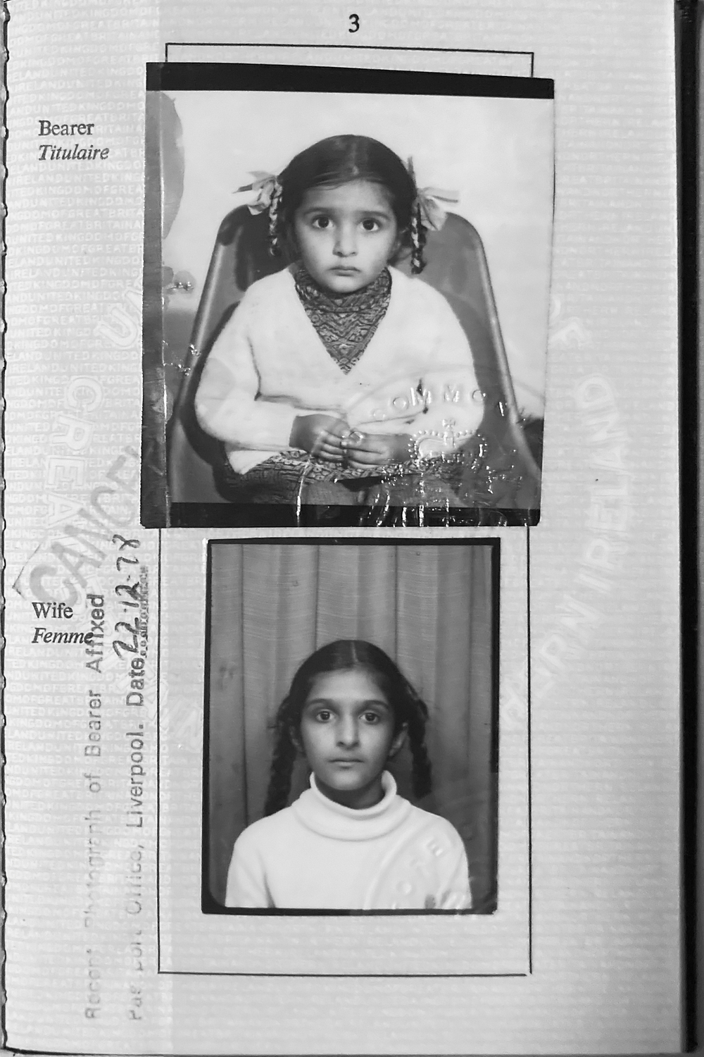 A black and white photo of a young girl with braided hair, seated, wearing a white turtleneck, looking directly at the camera. Above her, there is a portrait of the same girl as a young child, wearing a sweater and holding a doll. The photo appears t