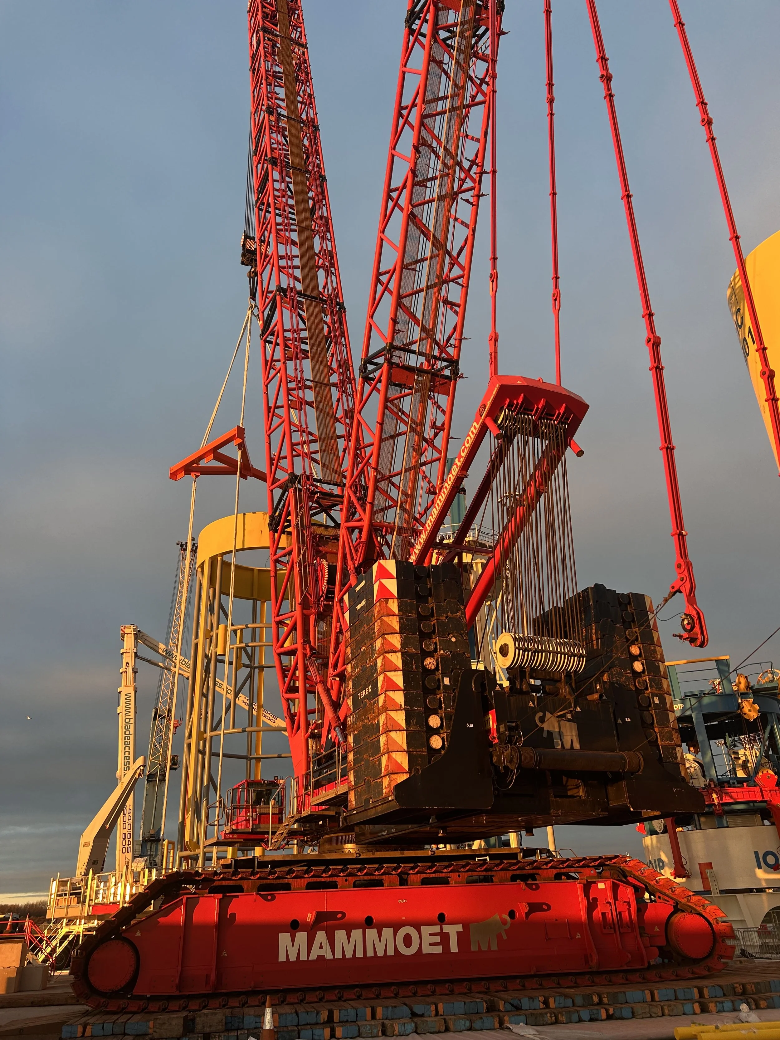 Large crawler crane with rigging suspended