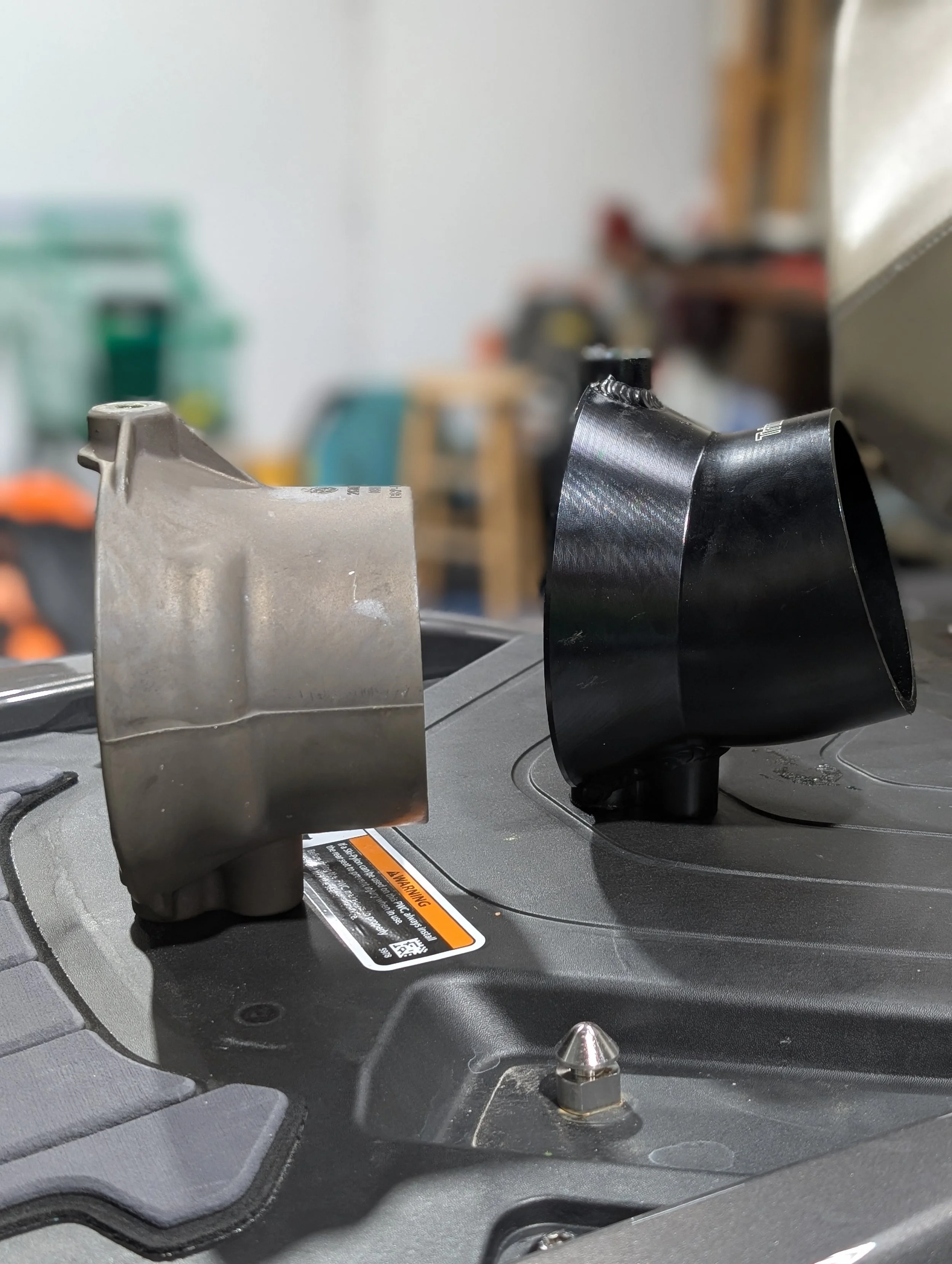 TrimX vs OEM Nozzle.jpg