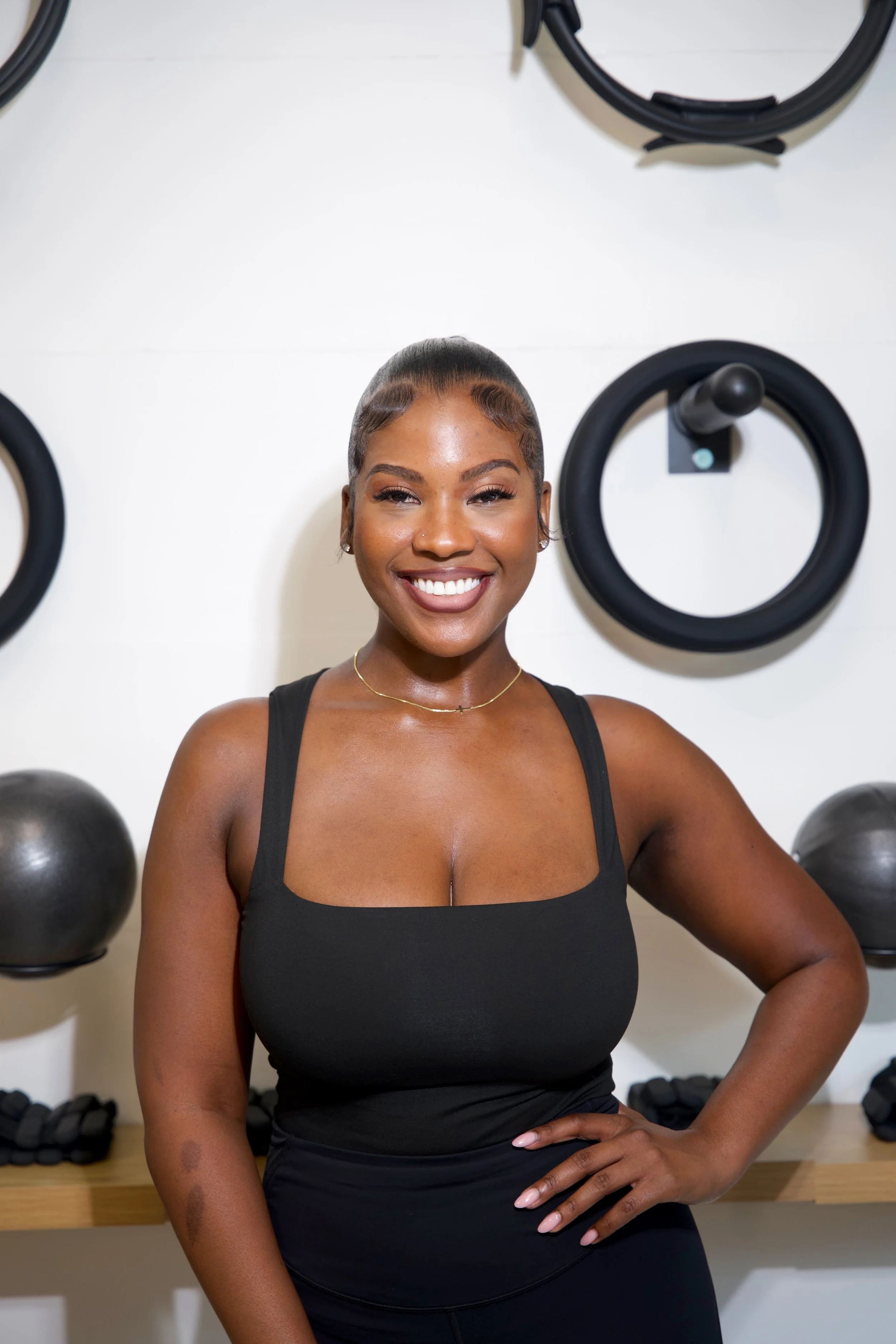 Destiny Rido, popular Pilates instructor, at Glow Up Pilates & Wellness in Pearland, TX.