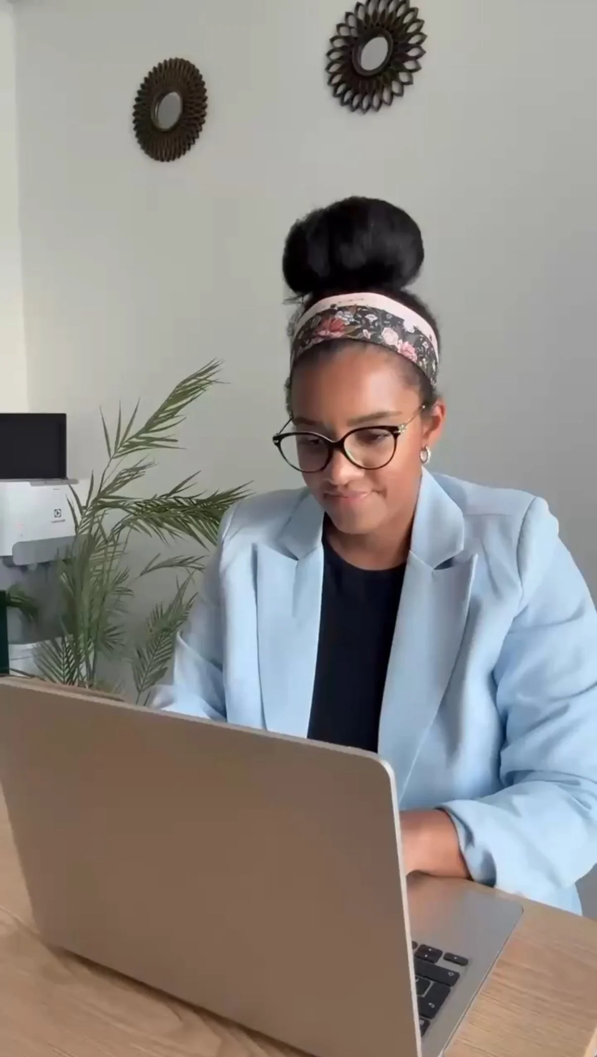 Mellisa Turner, founder of Sage & Sand, working on branding and web design projects — helping entrepreneurs build authentic, purpose-driven businesses online.