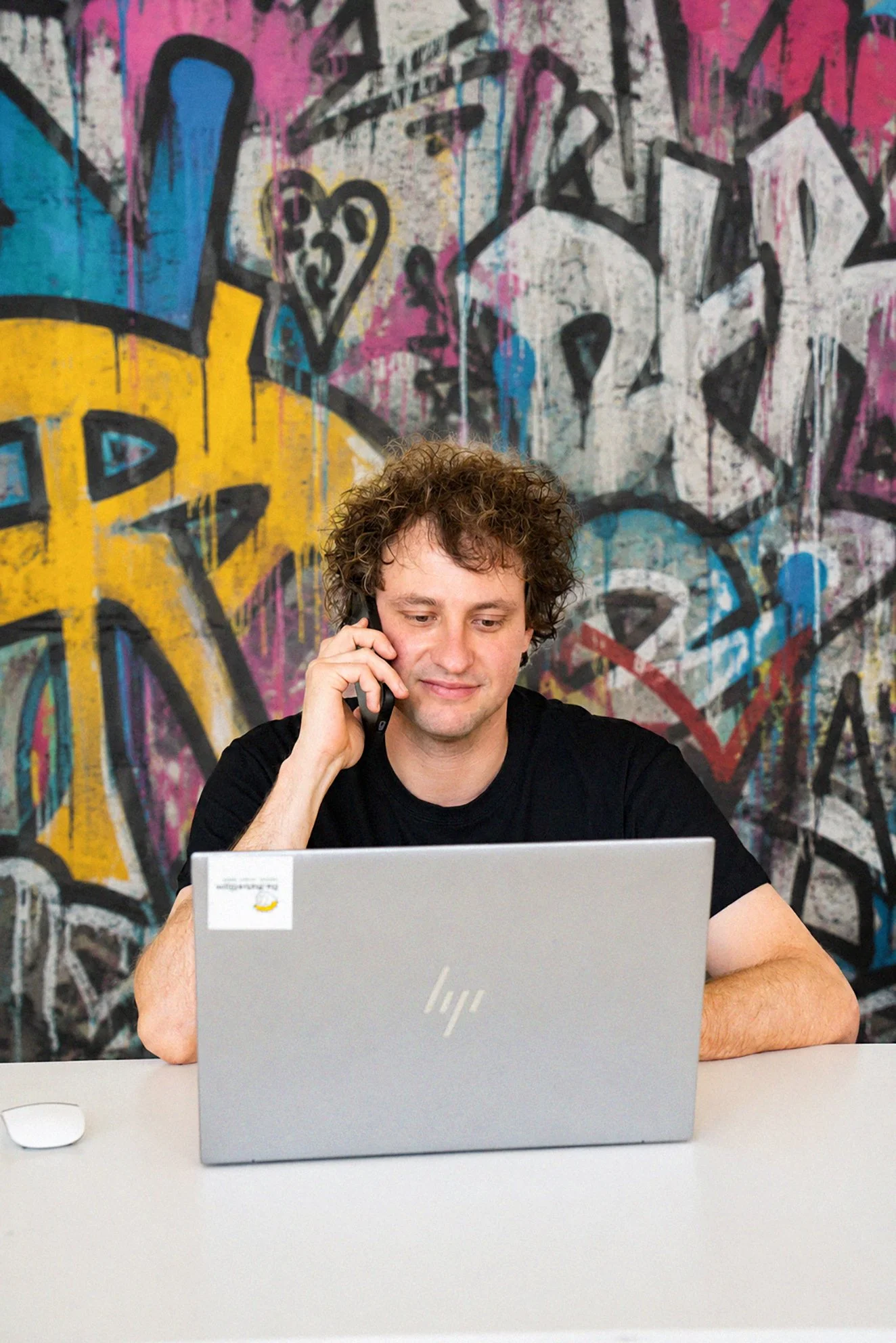 Michael Schmelcher is on the phone with refurbisher customers