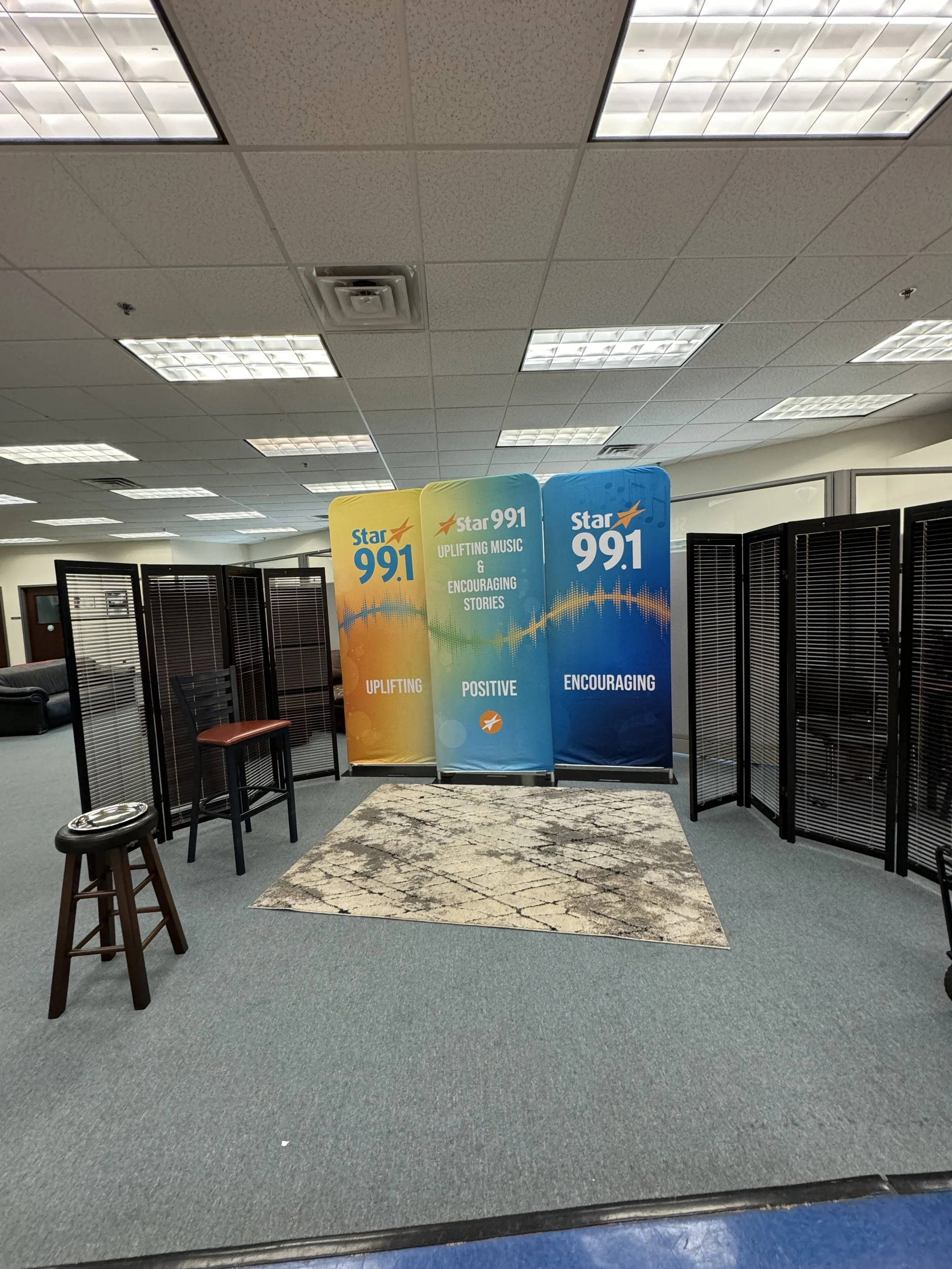 A setup for a visit by up-and-coming artist Emerson Day, who performed for a room full of STAR Volunteers, associates, and a virtual livestream of listeners. 