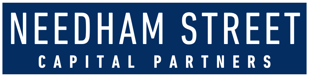 Blue rectangular sign with white text reading "Needham Street Capital Partners".